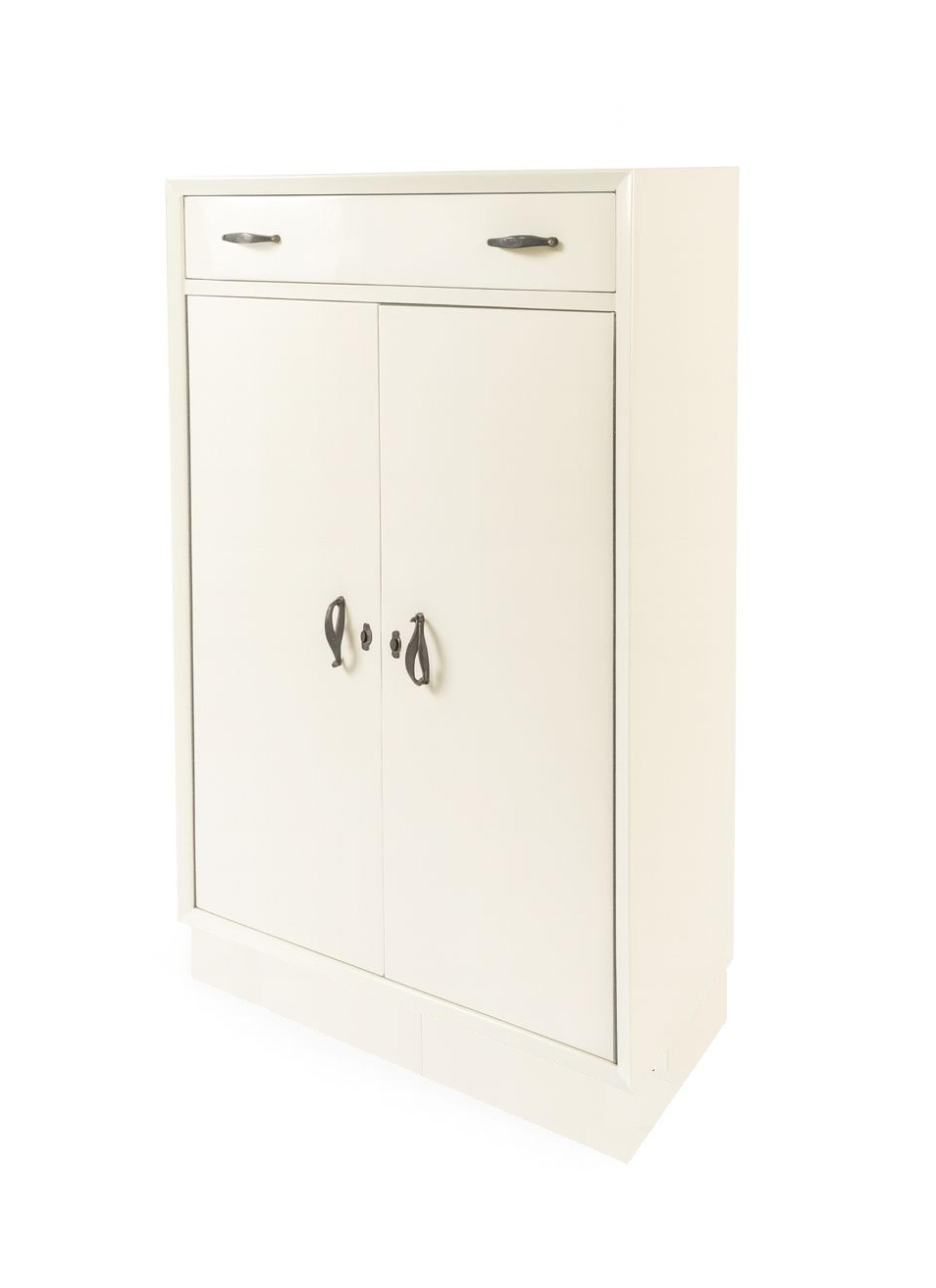 This off white refinished cabinet features a drawer and five shelves. It was crafted in the parish of Bonfim, Porto, Portugal, by Armazéns Nascimento, and is adorned with brass handles. 

Perfect for bold maximalist interiors—pair it with a riot of