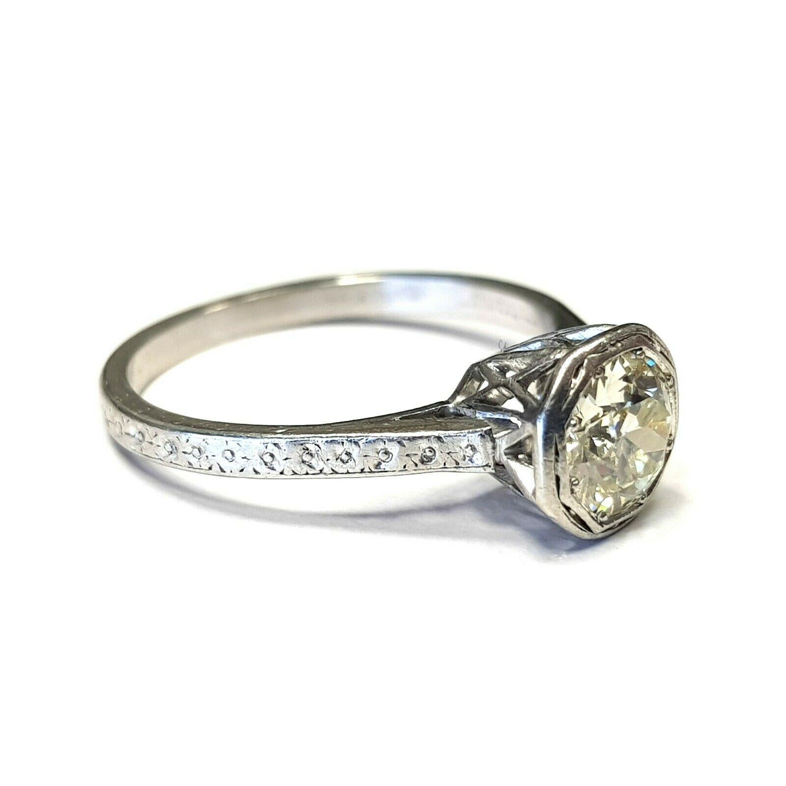  Specifications:
    main stone: OLD CUT DIAMOND 0.90CT
    additional: none
    diamonds: n/a
    carat total weight: n/a
    color: L
    clarity: VS1 
    metal: PLATINUM
    type: art deco ring
    weight: 4 gr
    size: 7.5 US
    hallmark: