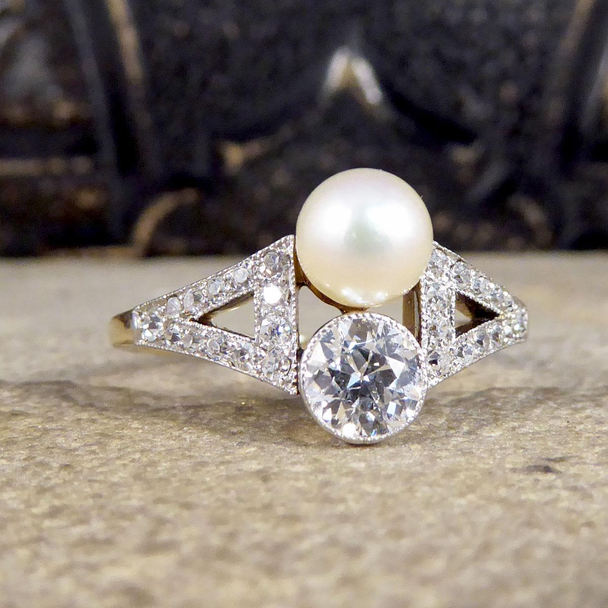 Such a stunning antique ring that has been hand crafted in the Art Deco era from 18ct Yellow Gold and Platinum. This ring holds one Natural Pearl lined up opposite to one 0.52ct Old European Cut Diamond in a millegrain rub over setting on the