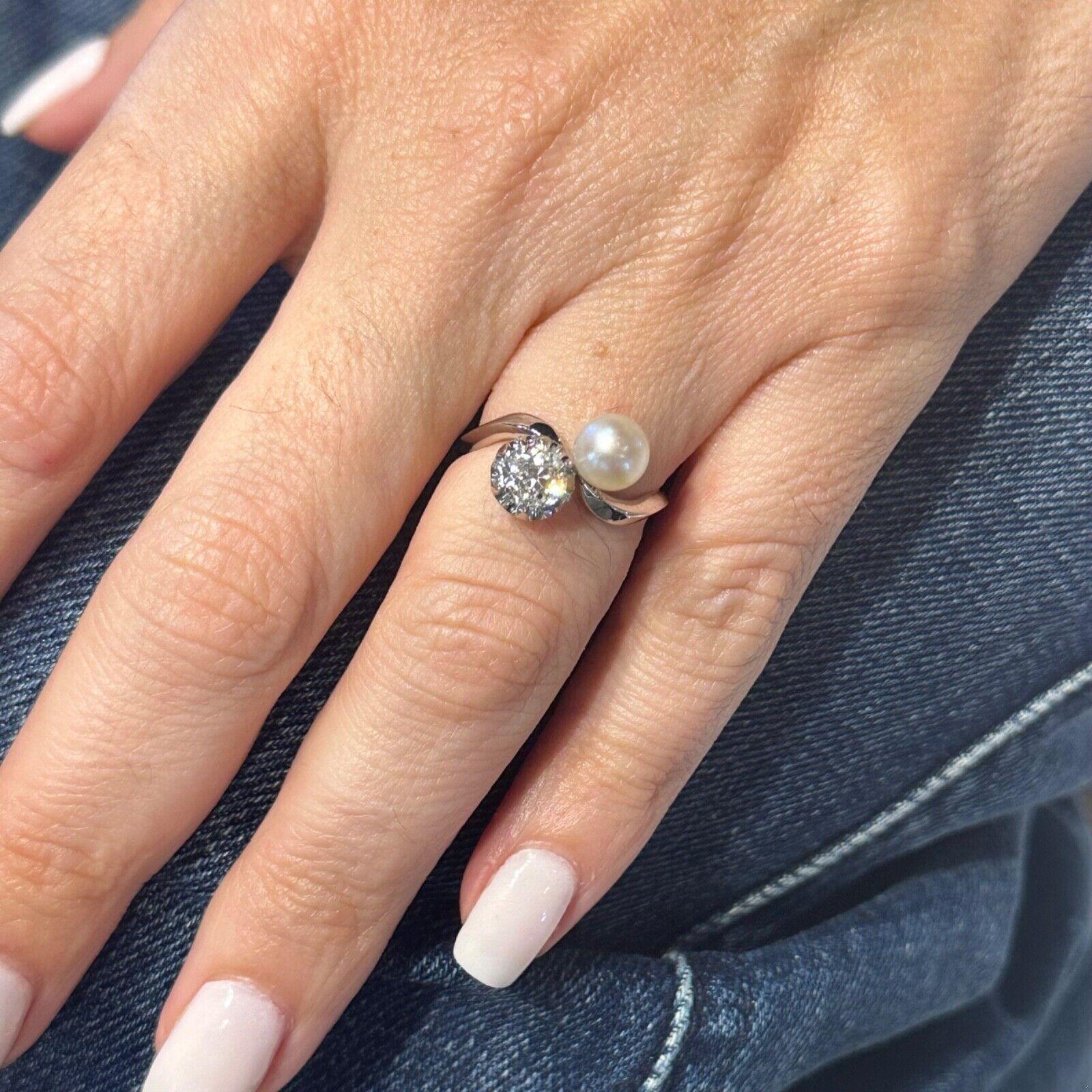 This beautiful Pearl and Diamond Ring is set in platinum and features an Old European cut diamond contrasted with a stunning pearl with a diameter of 6.68 mm. This ring is a timeless piece that will be a part of your jewelry collection for years to