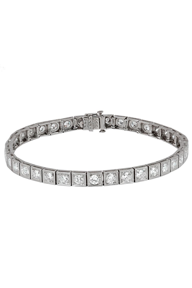 Beautiful craftsmanship Art deco Old European cut diamond bracelet. Each diamond is set with fine milgrain detailed square. The total diamond weight is almost 6 carats. The bracelet is 7.5 inches long.
Gemstone: Diamond
Cut: Old European Cut