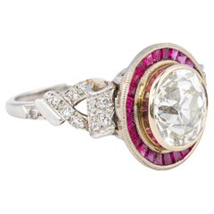 Anillo de compromiso Art Déco con halo de rubí y diamantes talla rosa