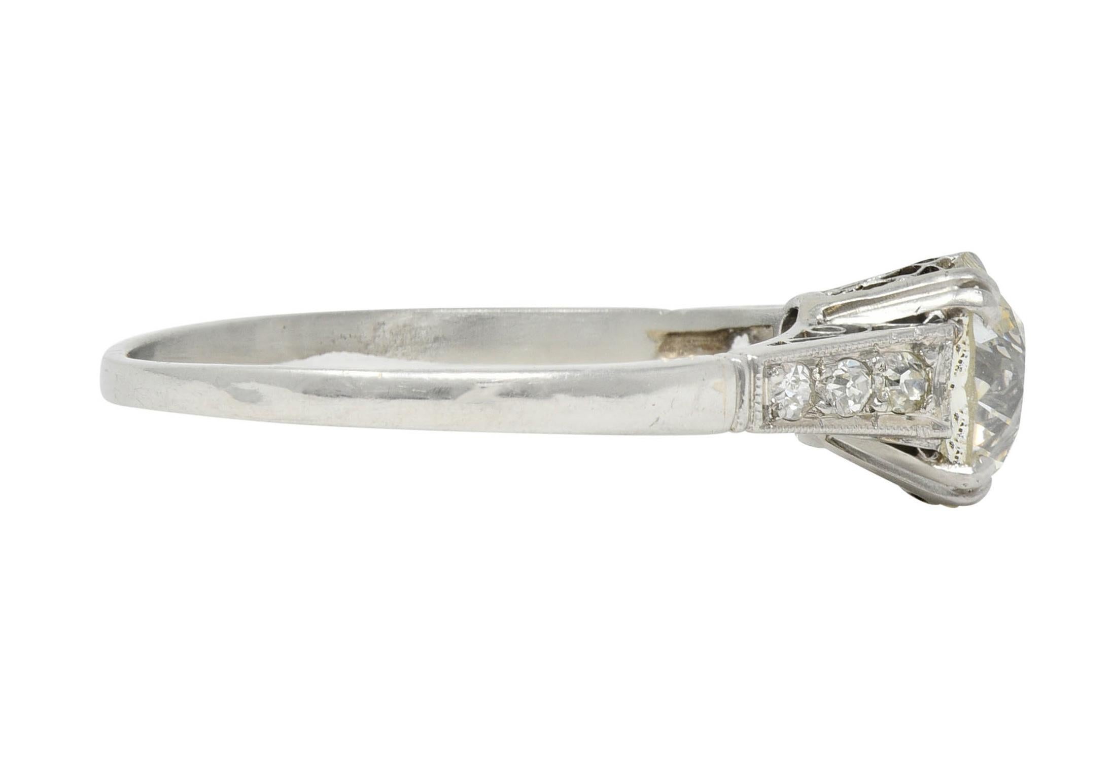 Art Deco Old Mine Cut Diamond Platinum Scrolling Vintage Engagement Ring In Excellent Condition For Sale In Philadelphia, PA