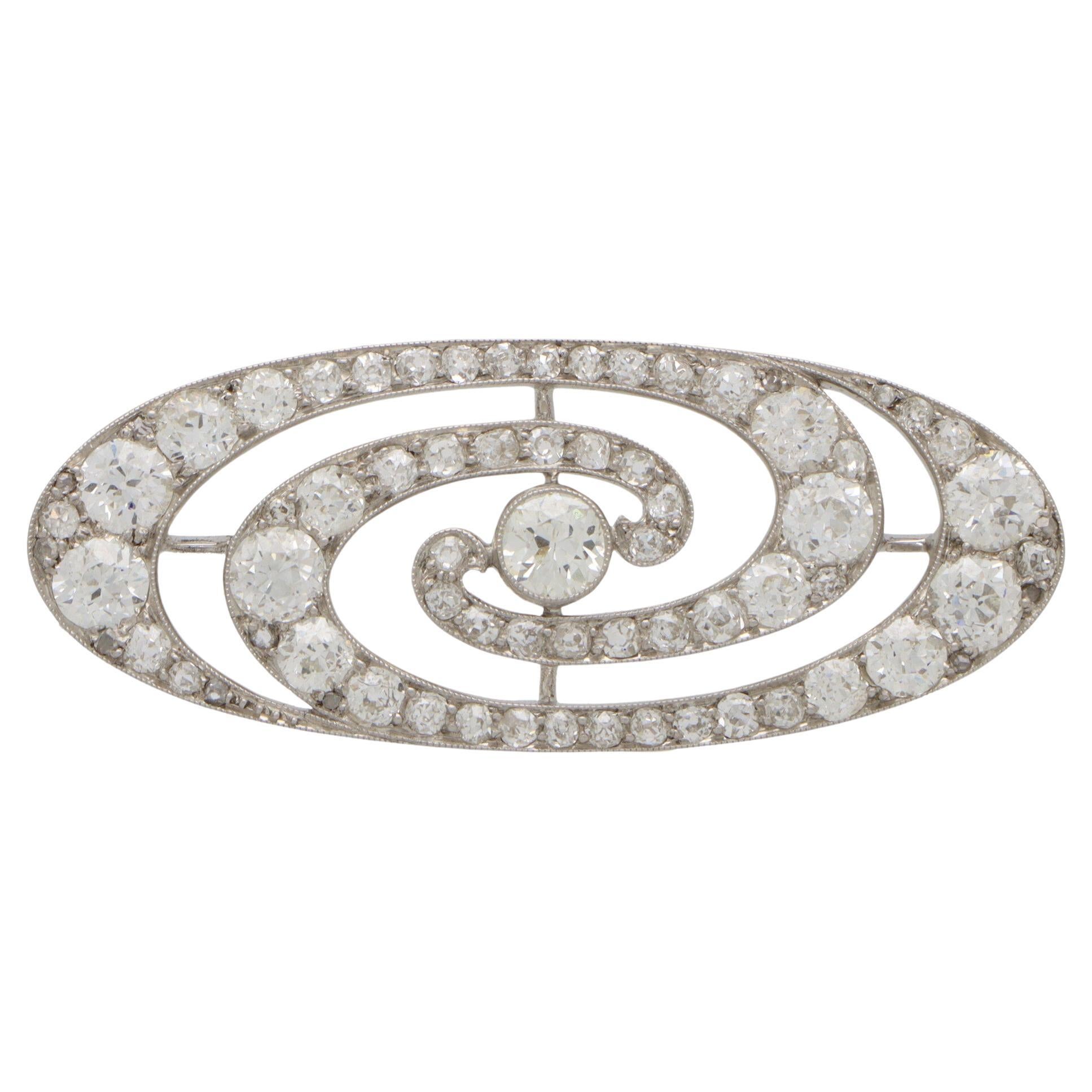 Art Deco Old Mine Cut Diamond Swirl Brooch Set in Platinum