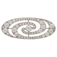 Art Deco Old Mine Cut Diamond Swirl Brooch Set in Platinum