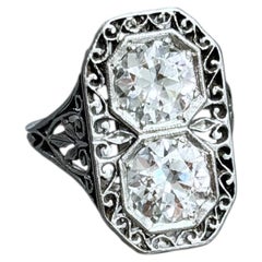 Art Deco Old Mine Cut Diamond Toi-Et-Moi Ring In Platinum.