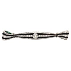 Art Deco Onyx 0.94 Carat Diamond Platinum Bow Brooch circa 1920