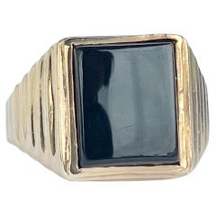 Siegelring aus Onyx und 9 Karat Gold im Art déco-Stil
