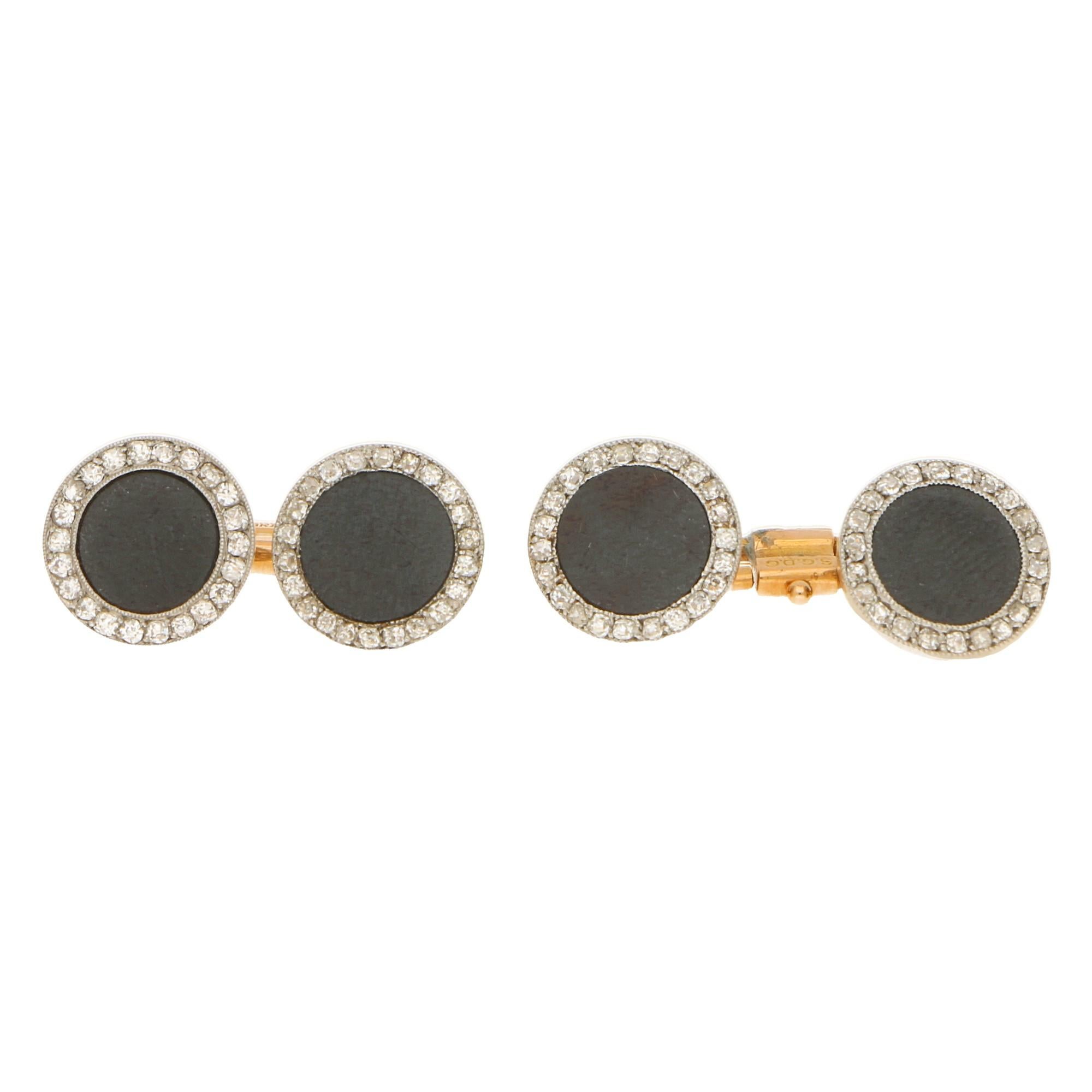 A spectacular Art Deco onyx and diamond dress set in platinum and yellow gold, cased by Cartier, French, circa 1920. 

The set is composed of a pair of cufflinks, four shirt studs and two waistcoat buttons en suite. Each double-sided cufflink is