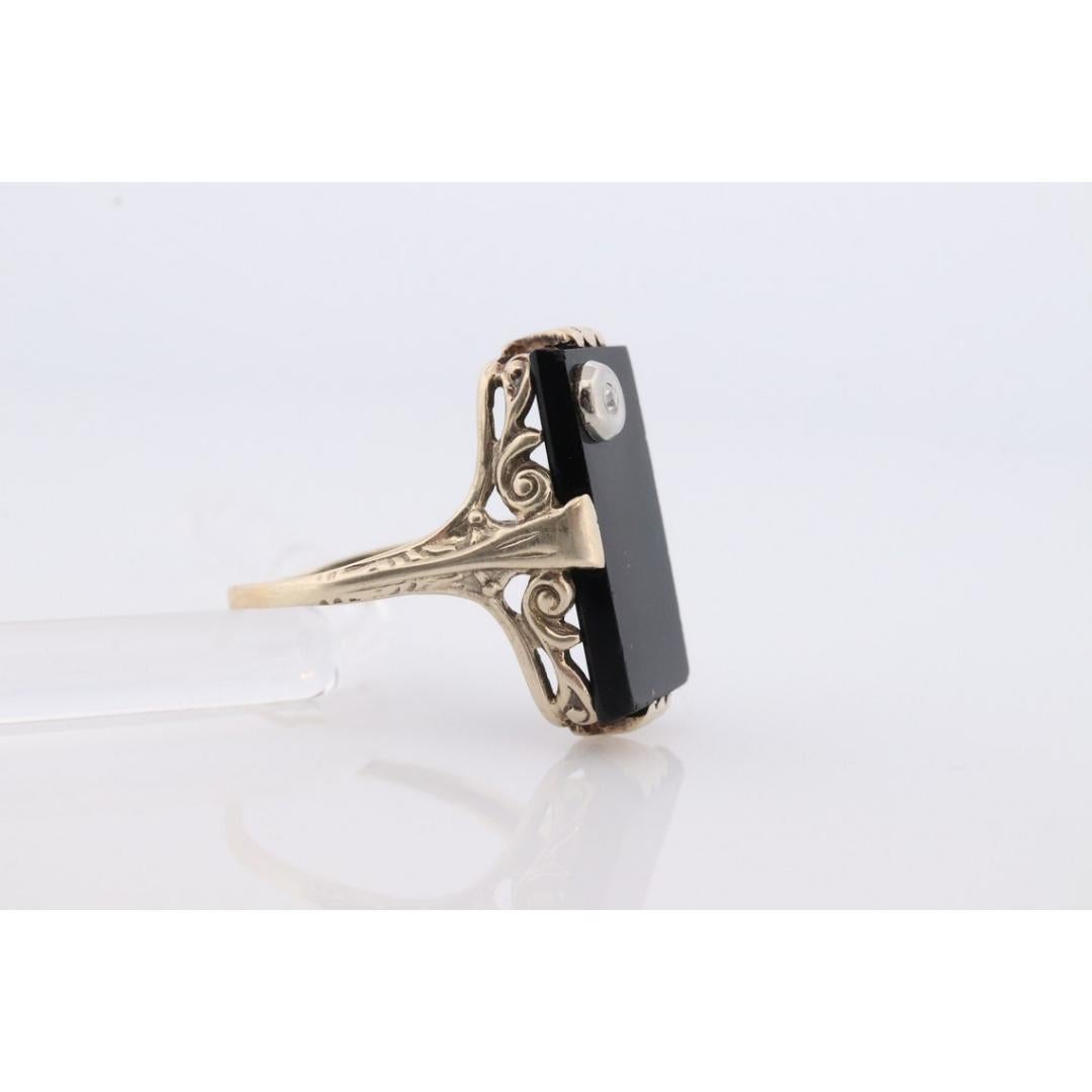 Art Deco Onyx and Diamond Ring. 14k Yellow Gold Rectangle Onyx and Diamond ring. In Good Condition For Sale In Port Charlotte, FL