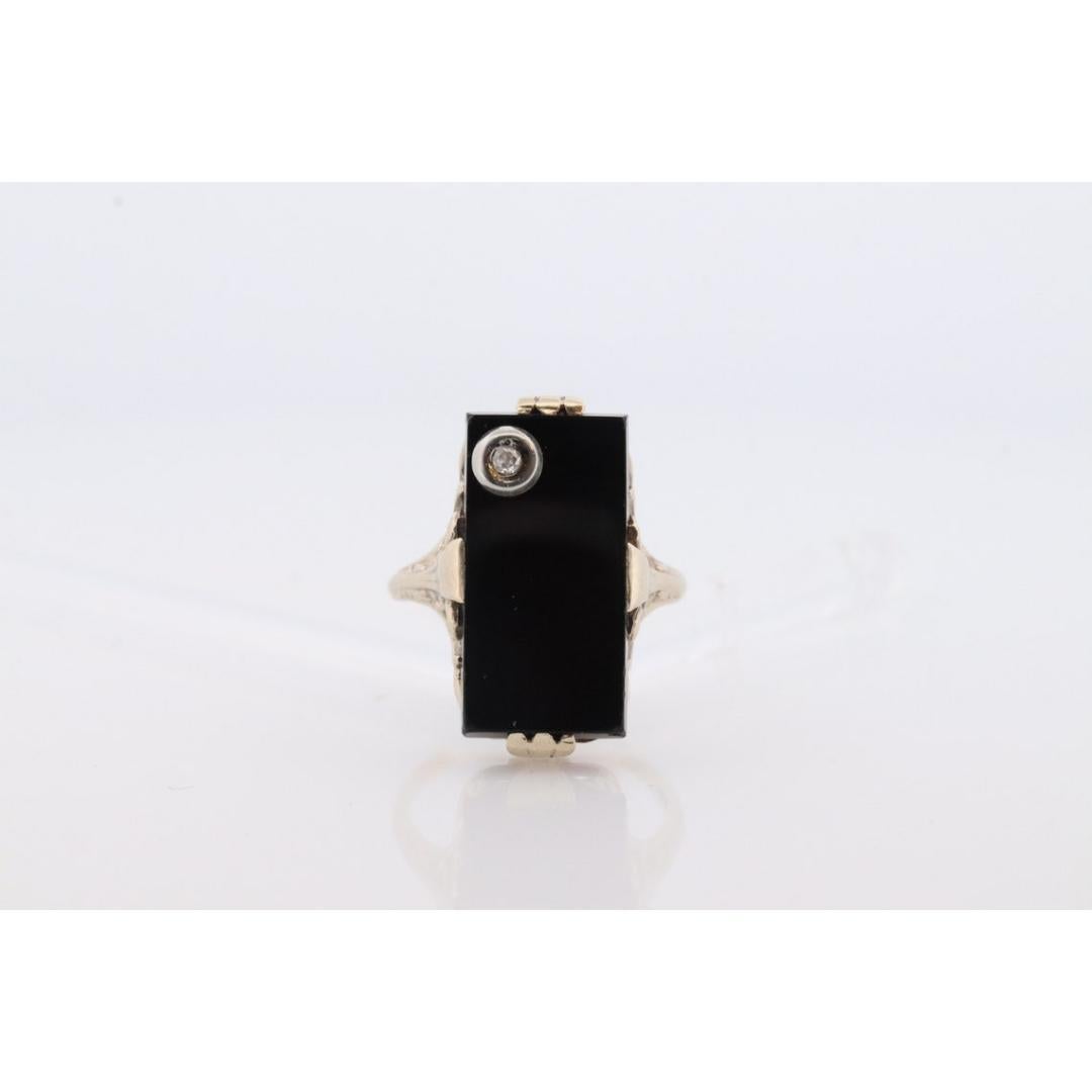 Women's or Men's Art Deco Onyx and Diamond Ring. 14k Yellow Gold Rectangle Onyx and Diamond ring. For Sale