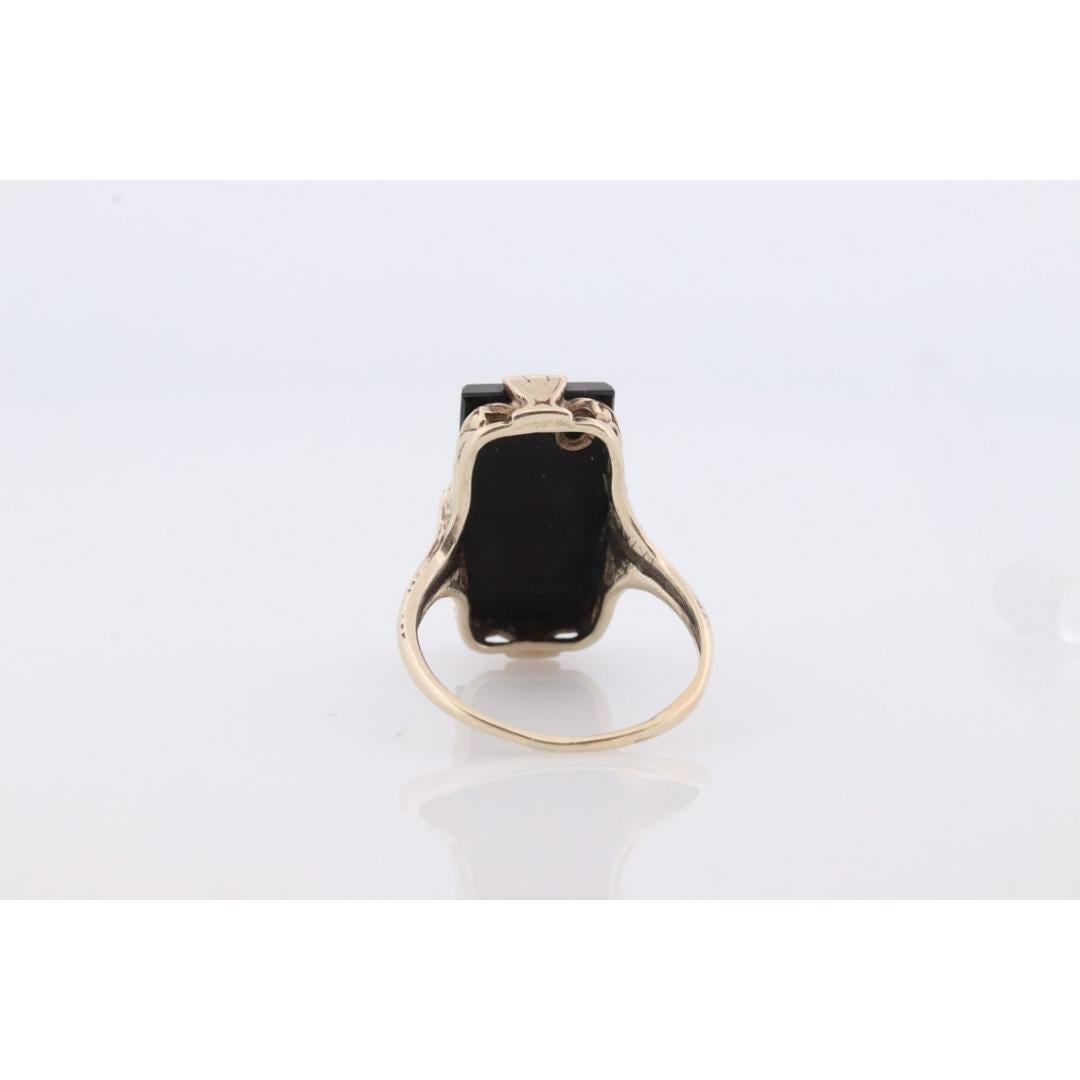 Art Deco Onyx and Diamond Ring. 14k Yellow Gold Rectangle Onyx and Diamond ring. For Sale 2