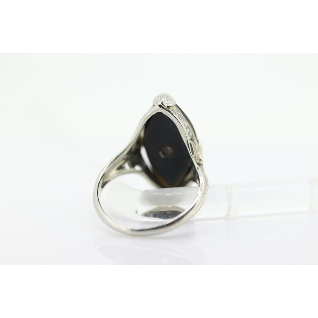 Art Deco Onyx and Sapphire Ring. 14k Filigree White Gold Marquise Onyx and White In Good Condition For Sale In Port Charlotte, FL
