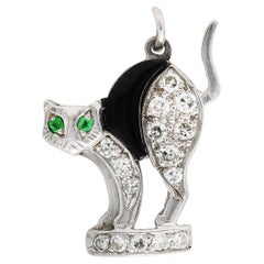 Breloque chat antique Art déco en platine, onyx, diamants et émeraudes