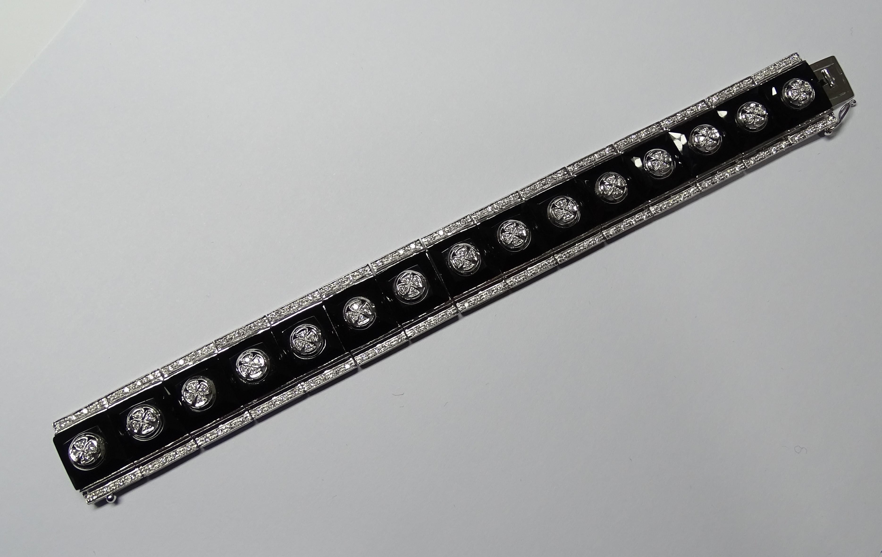 The Bracelet is made of 18K White Gold.
The Bracelet has 1.80 Carat of White Diamonds Modern Round Cut.
The Bracelet has 15 faceted cut onyx.
This Bracelet is inspired by Art Deco.
We're a workshop so every piece is handmade, customizable and
