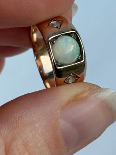 Bague art déco en or 9 carats avec opale et diamant