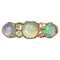 Art Deco Opal and Diamond 9 Carat Gold Three-Stone Ring