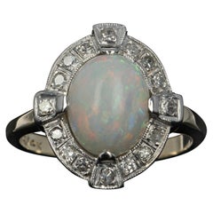 Art Deco Opal and Diamond Halo Ring, 14 Karat Yellow Gold Vintage 2.01 Carat