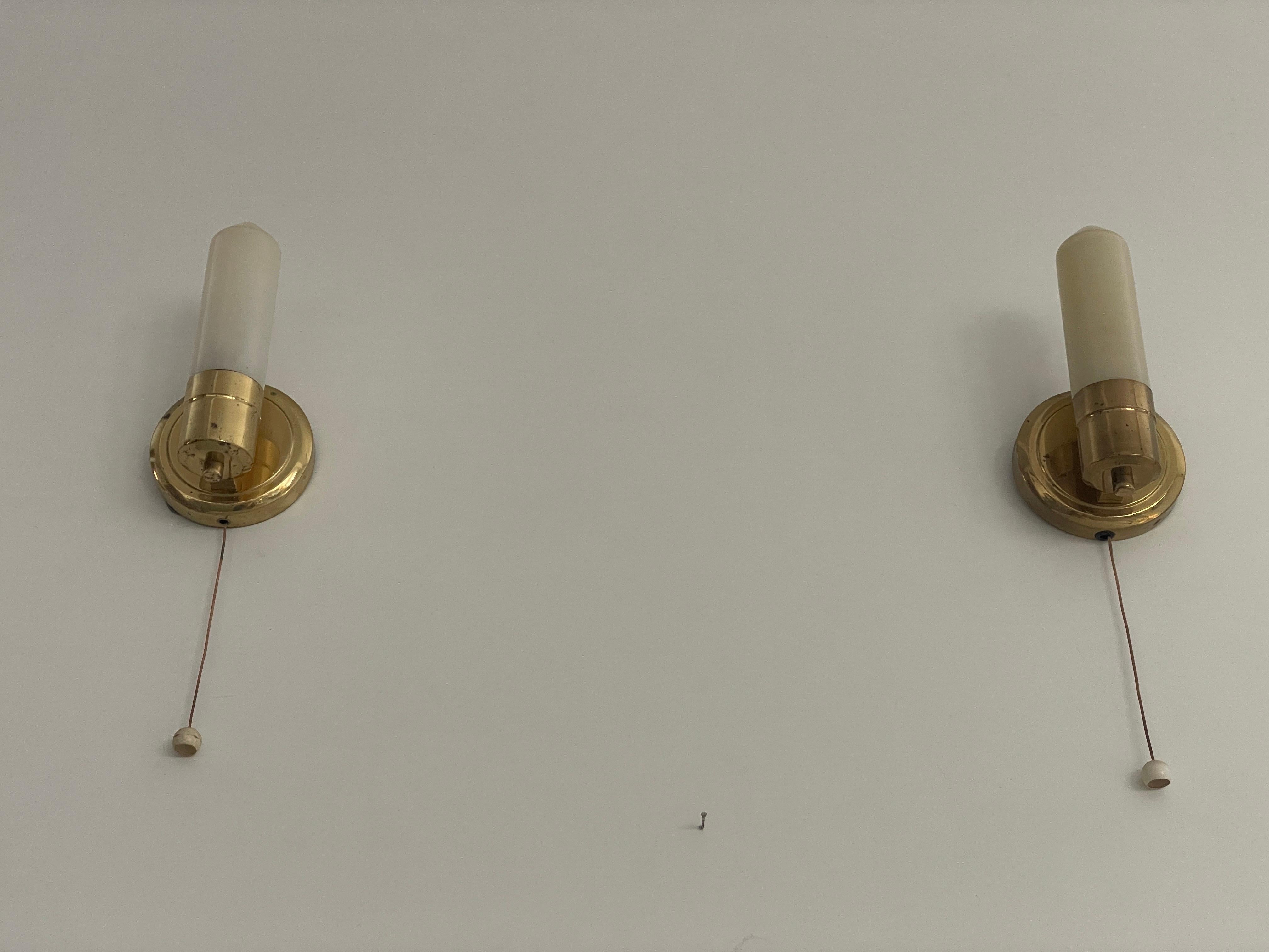 Art Deco Opaline Glass and Brass Sconces, 1940s, Germany
Lampshades are in very good vintage condition.


This lamp works with E14 light bulb. Max 100W
Wired and suitable to use with 220V and 110V for all countries.


Measurements:
Height: 19