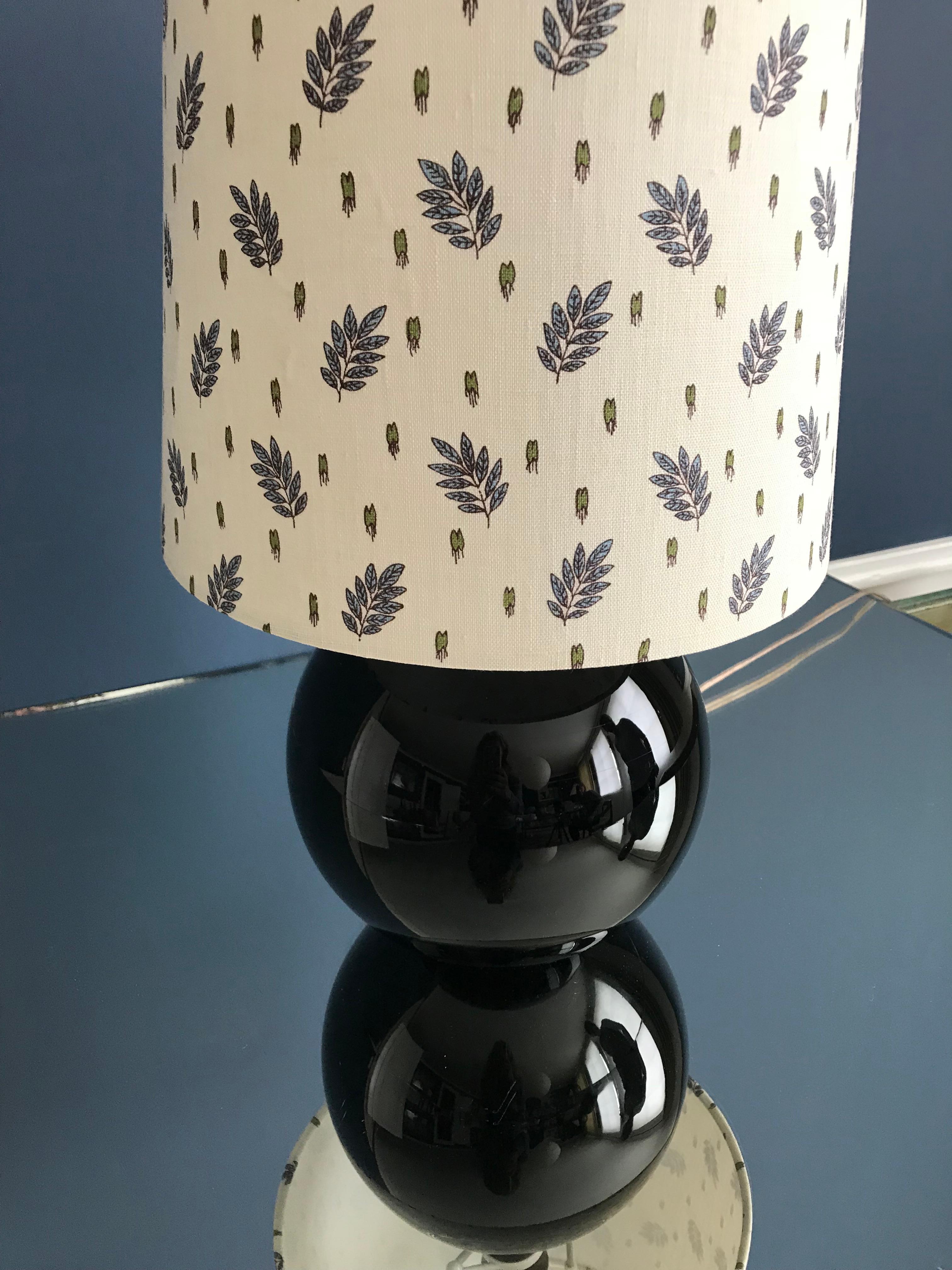 Elegant black Art Deco opaline table lamp with new upholstered lamp shade.