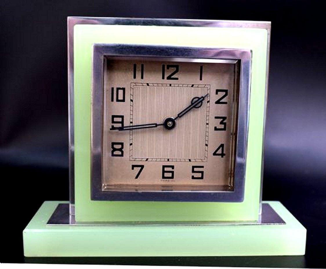 Original 1930's Art Deco green glass 30 hour clock with chrome accents. Perfect size for desk or table. We have two of these clocks currently should you want a pair, let us know. It’s freshly serviced with the mechanism having been through an