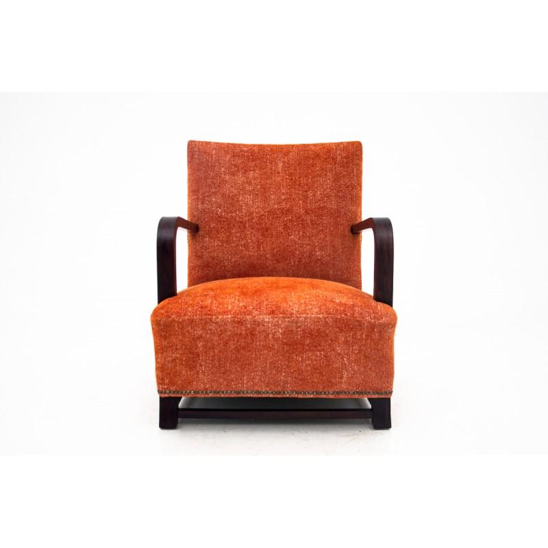 Art Deco vintage armchair come from Germany, from circa 1960s. Simple, stabile form. Wood after renovation.
Upholstered with a new retro style orange fabric.
Very good condition.
