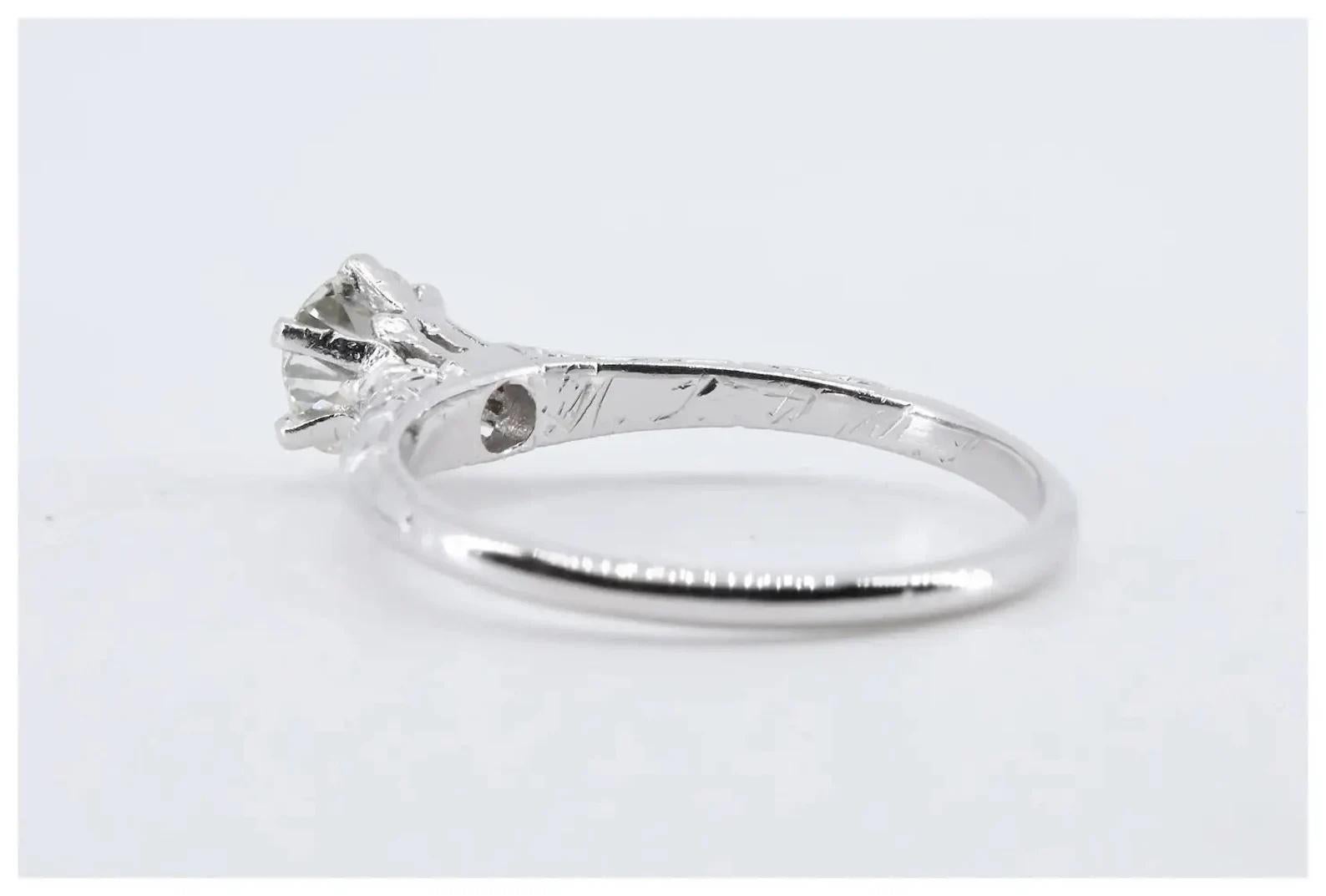 Art Deco Orange Blossom 0.75ct Diamond Engagement Ring in Platinum In Good Condition For Sale In Boston, MA