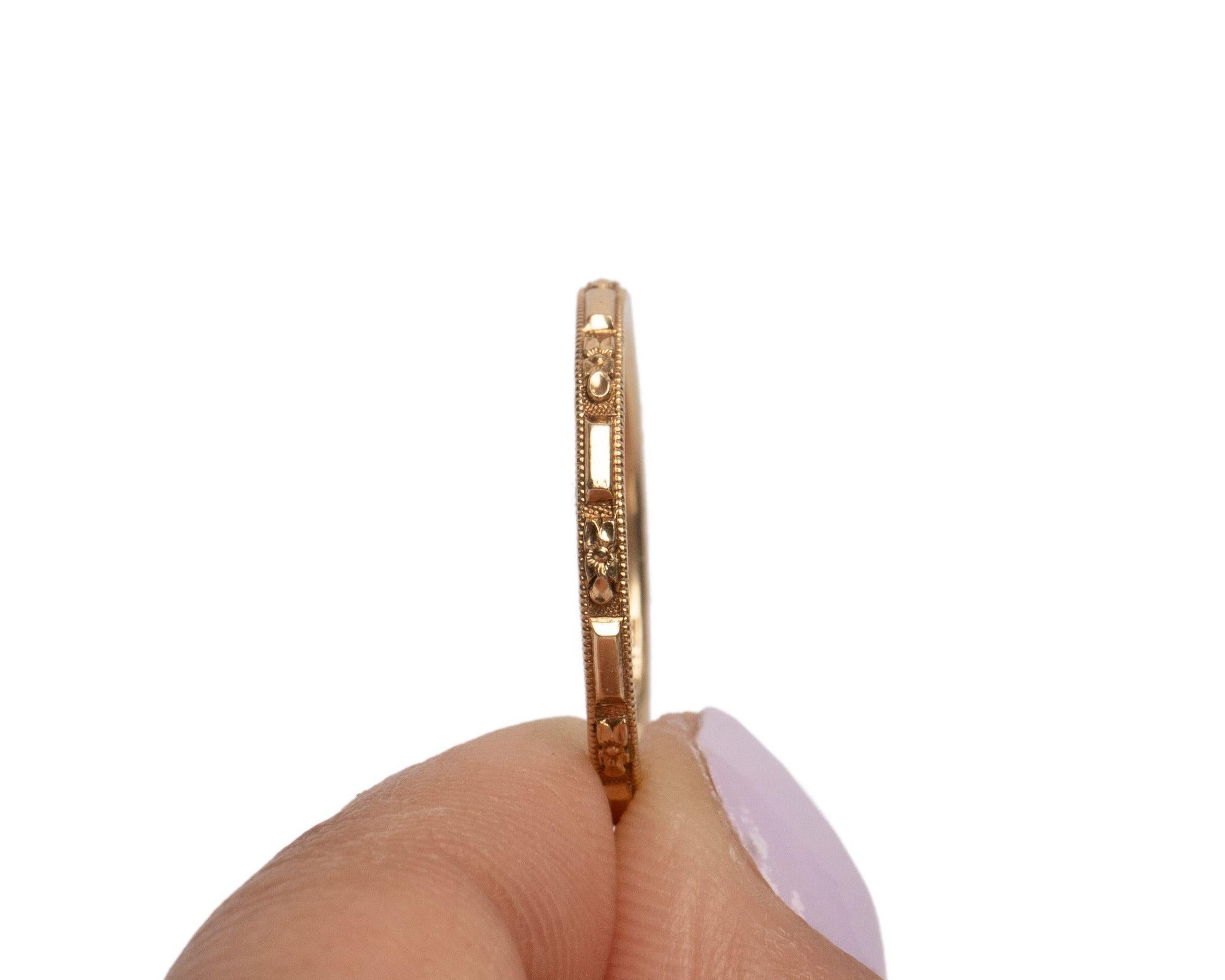 This piece is a genuine 1920's yellow gold Orange Blossom Traub wedding band! This beautiful dainty band is an excellent example of the early 20th-century style! Likely from the 1920's this Art Deco beauty features a floral carved design all of the