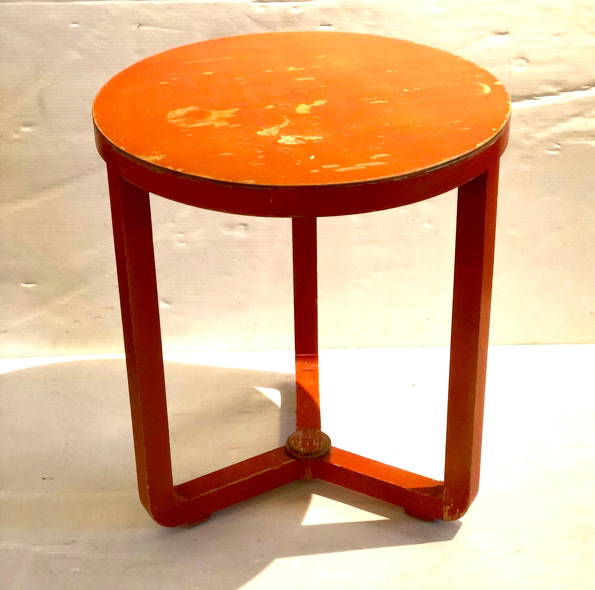 Beautiful well constructed small orange patinated nicely worn cocktail table, circa 1940s solid and sturdy with scratches and worn due to age but gives great character to the piece, in the style of Alvar Aalto. There is stamped on the bottom N. I