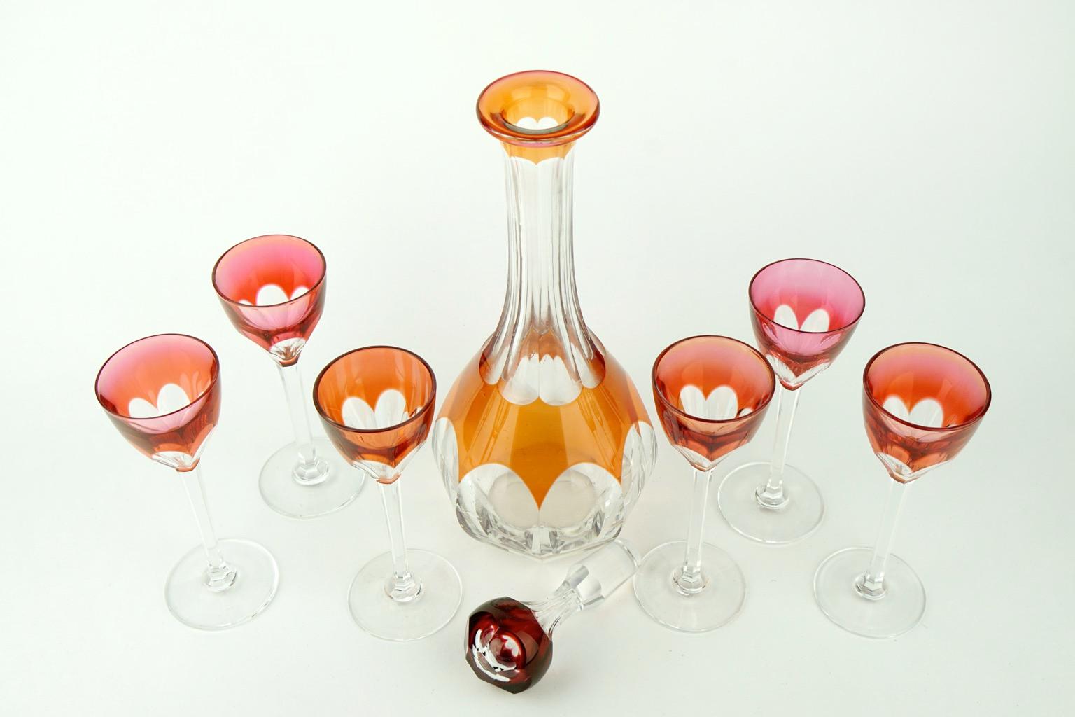 One decanter set with six glasses in very good condition. Original stopper.
Measures: Decanter, height 28 cm, diameter 9 cm.
Eight glasses, height 12.8 cm, diameter 4.5 cm.