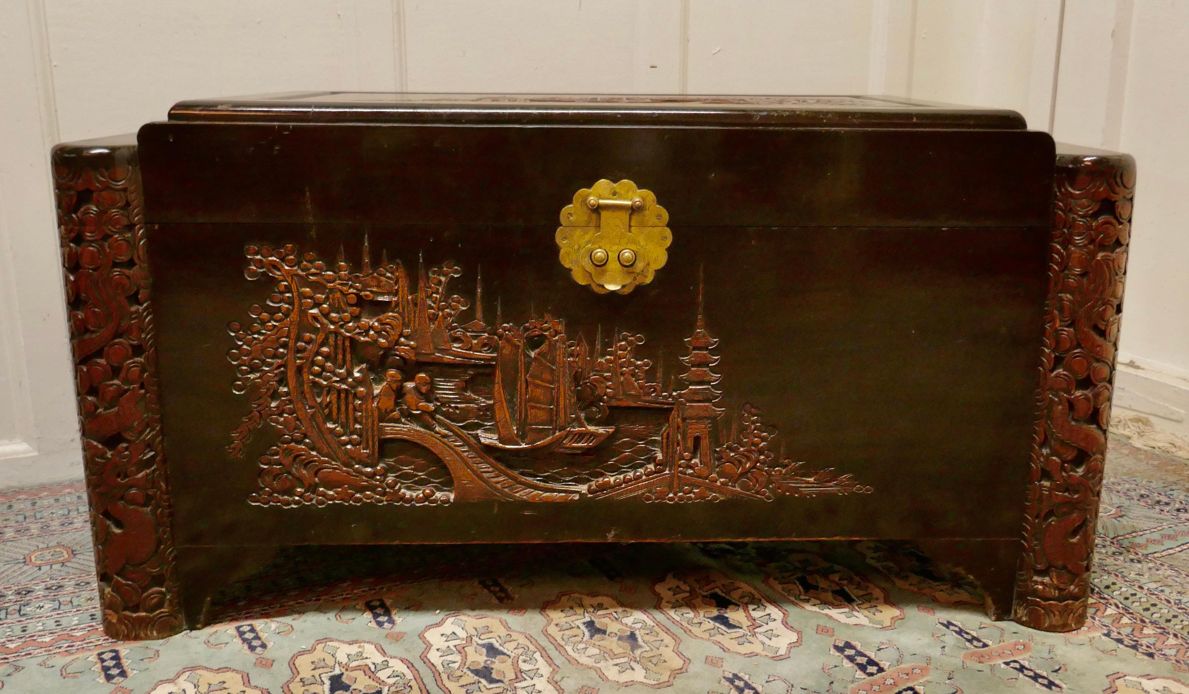 Art Deco Oriental Carved Camphor Wood Chest


This Beautiful Carved Chest is made from Camphor Wood, for those of you who do not know camphor wood it is a hard wood which lends itself very well to carving.
However the main reason for using camphor