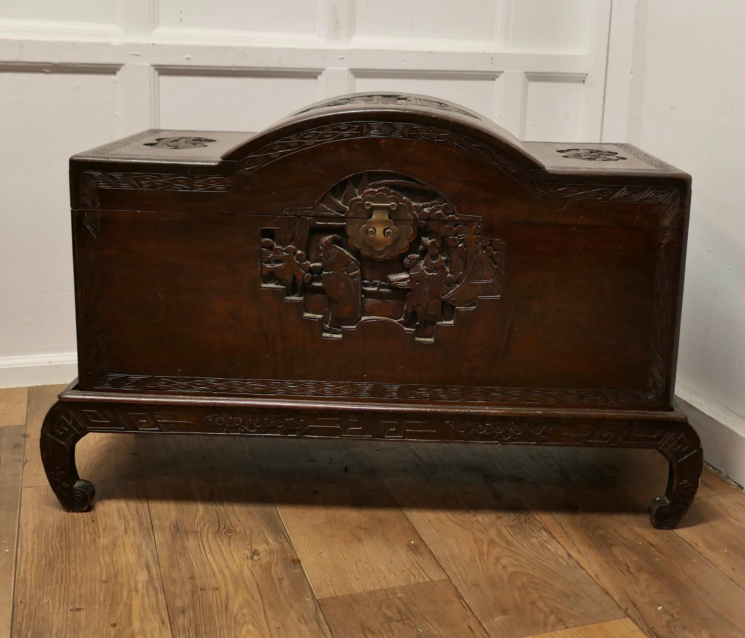 Art Deco Oriental Carved Camphor Wood Chest

This Beautiful Carved Chest is made from Camphor Wood, for those of you who do not know camphor wood it is a hard wood which lends itself very well to carving.
However the main reason for using camphor