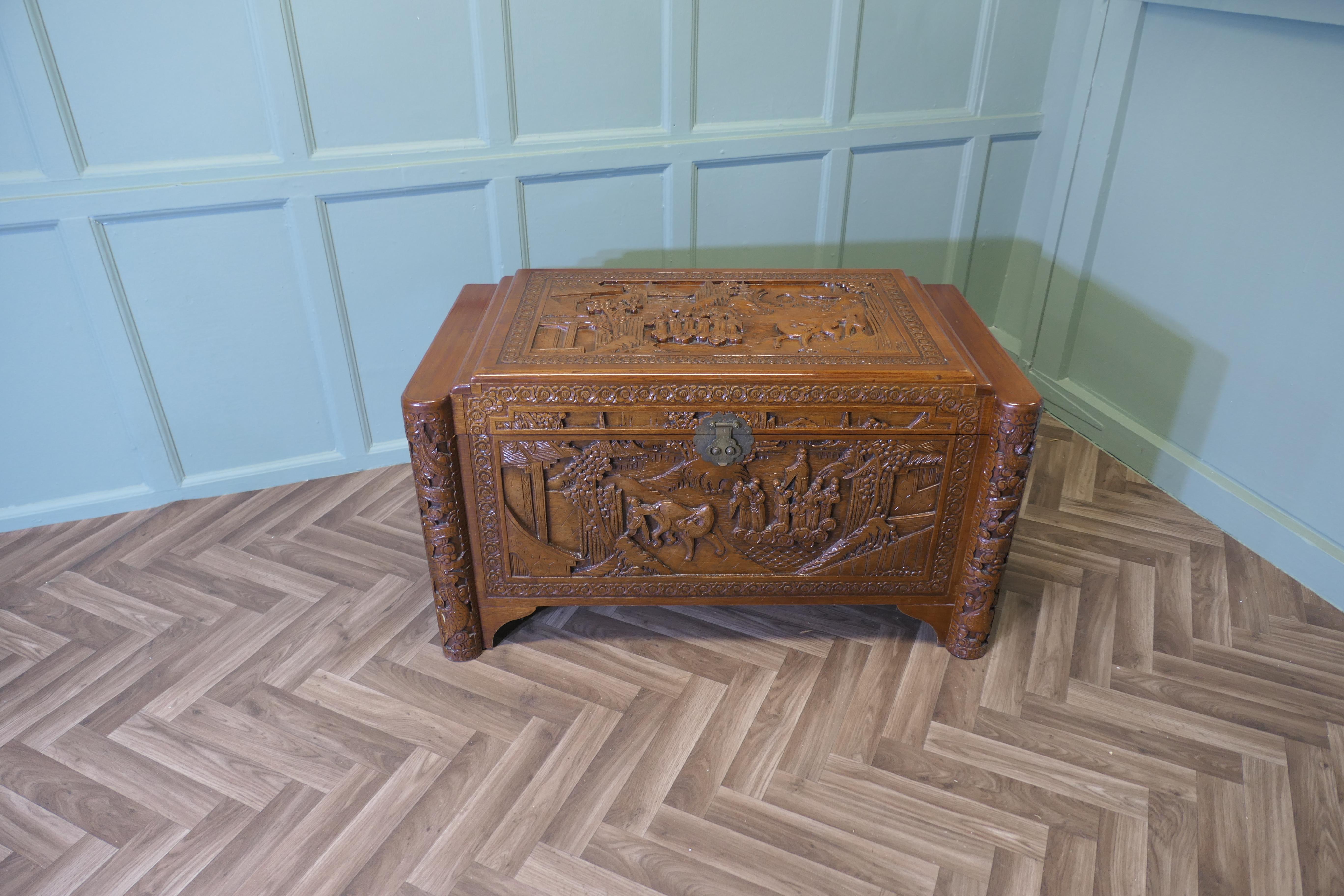 Chinoiserie Art Deco Oriental Carved Camphor Wood Chest For Sale