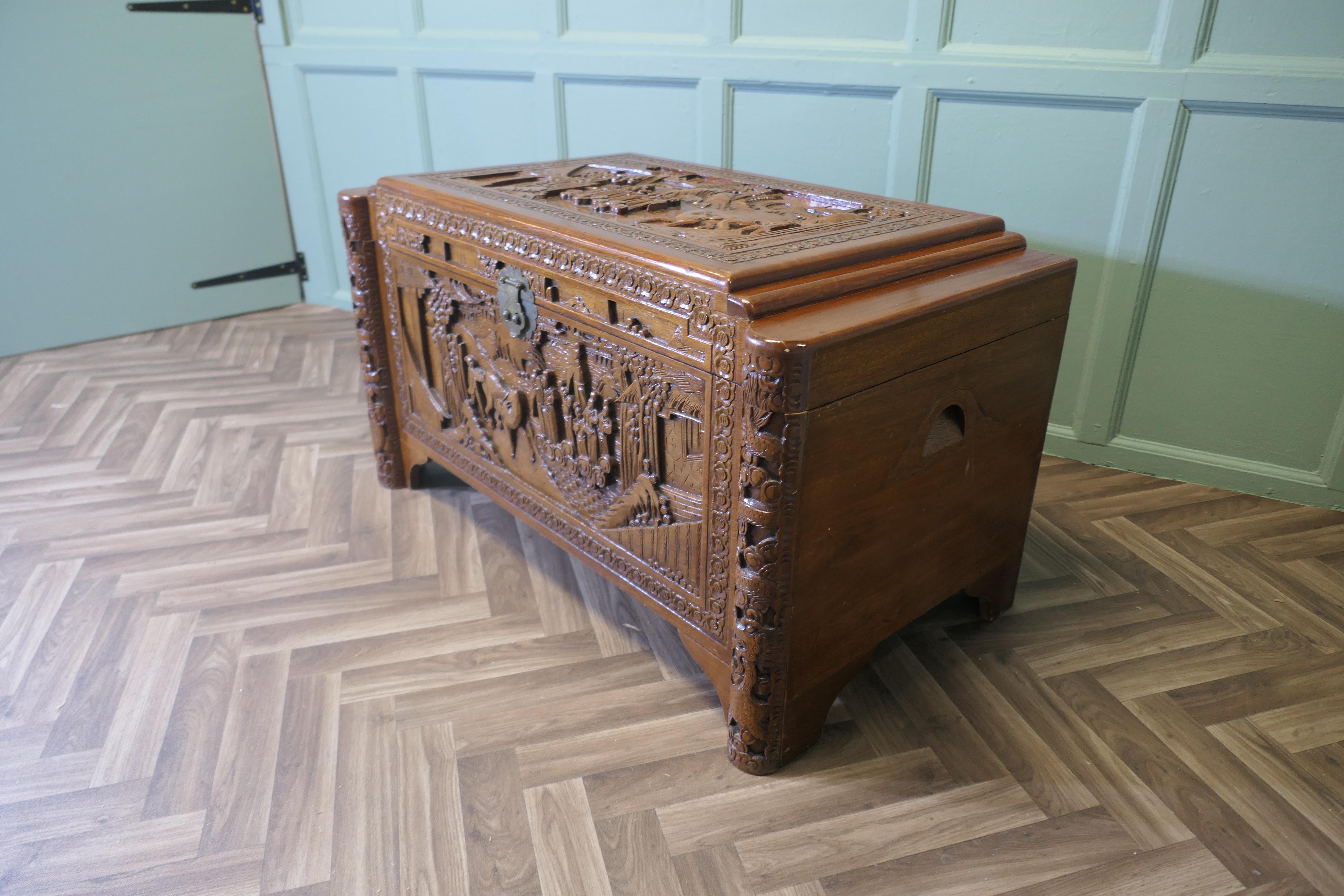 Early 20th Century Art Deco Oriental Carved Camphor Wood Chest For Sale