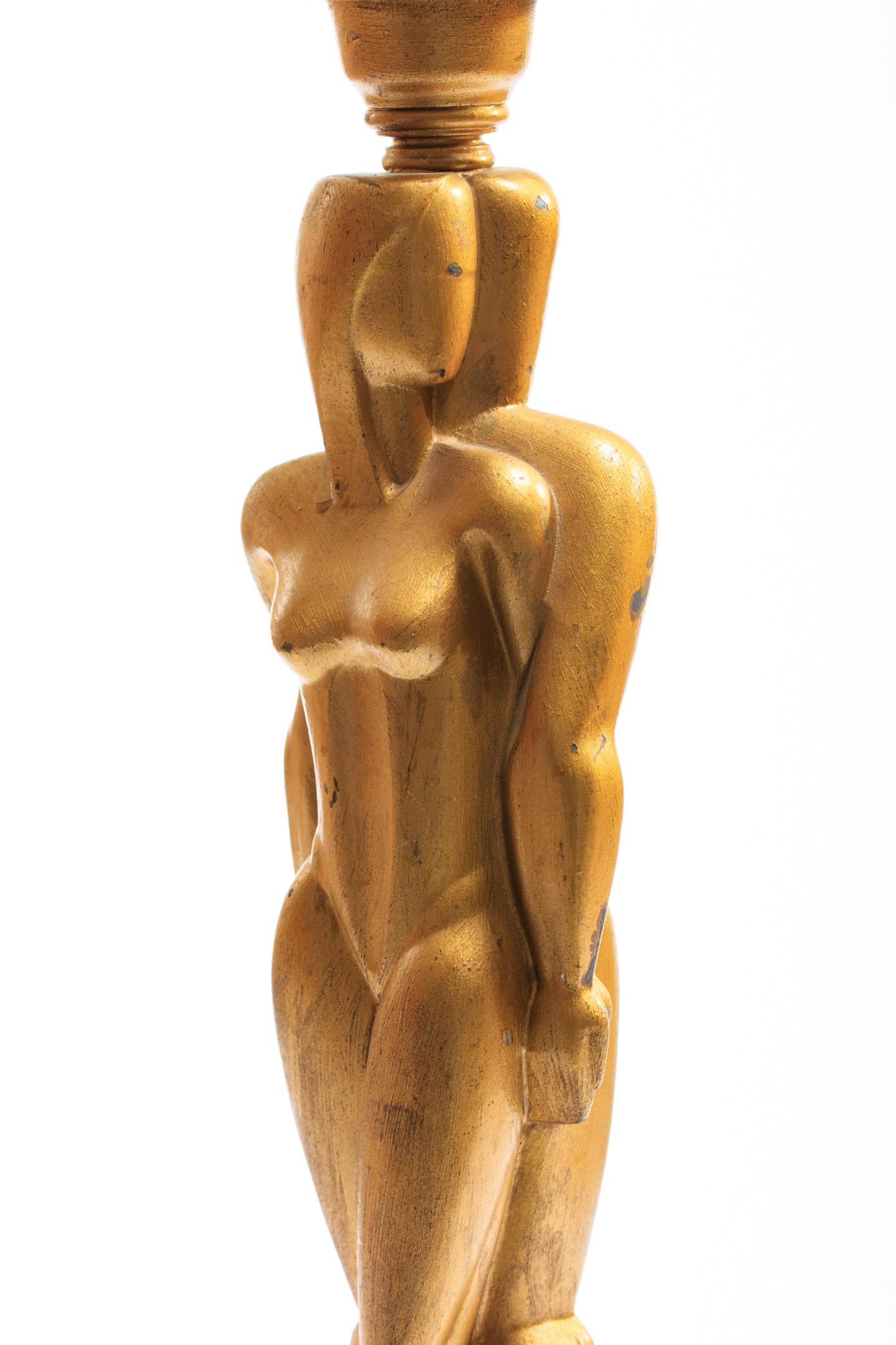 Stunning Art Deco lamp by Viktor Schreckengost for Chicago based lamp company Colonial Premier. Cubist nude male/ female figures have similar styling to Cedric Gibbons design for the Oscar. Gold paint on the lamp is not recent. It has some minor