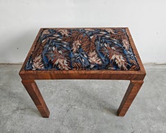 Art Deco Ottoman done in Walnut upholstered in plush with floral print
