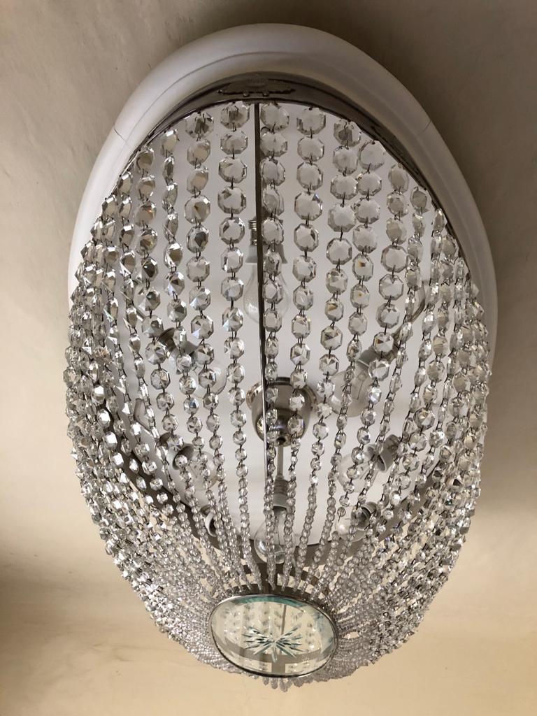 Oval brass frame nickel-plated fitted with nine E27 bulbs, cut crystal octagons, Flush Mount. Made in Vienna by Carl Hiess in the 1920s.
Delivery time about 2-3 weeks.