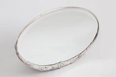 Art Deco Oval Mirror with Sculpted Floral Motif in Silvered Bronze, France 1930s