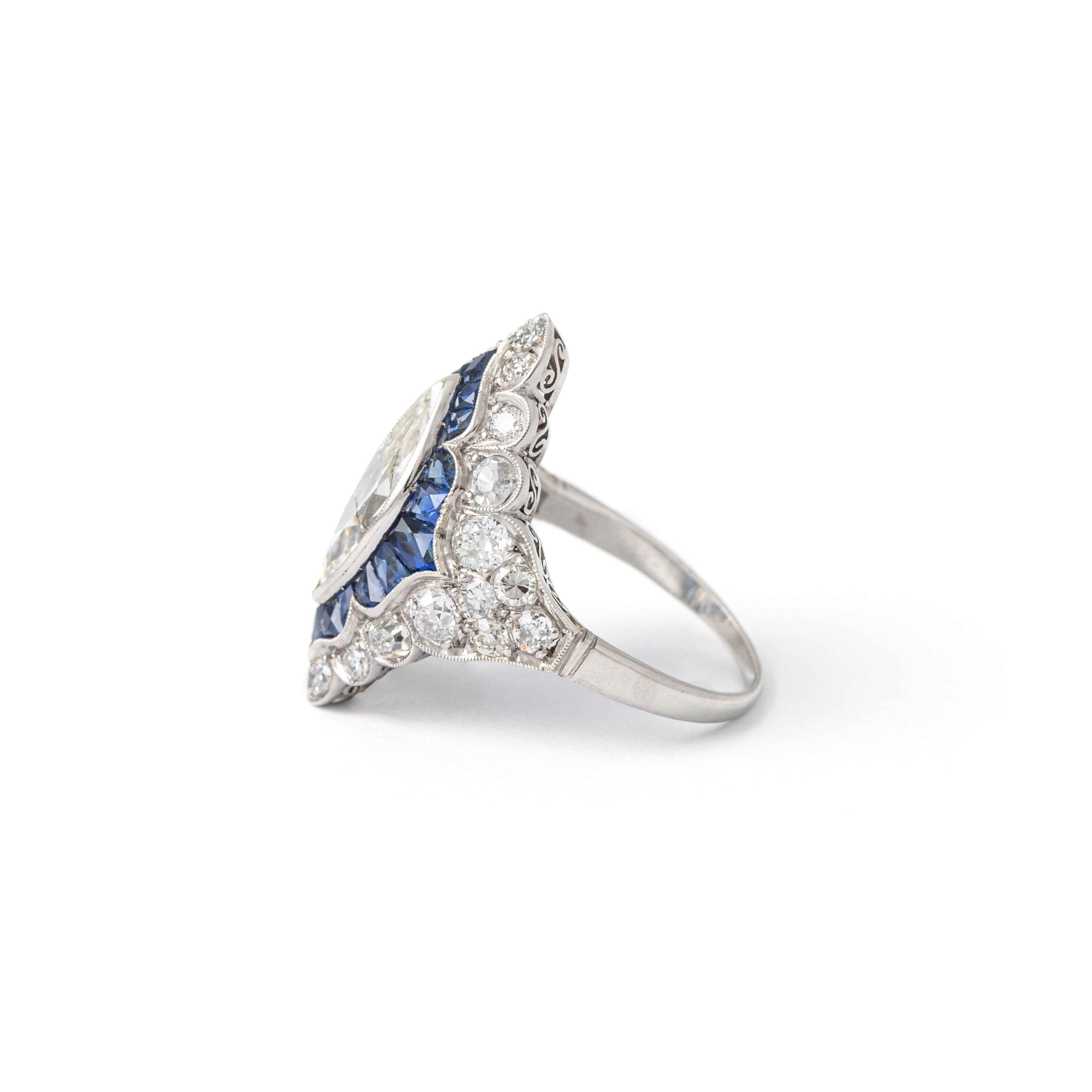 Women's or Men's Art Deco over 2 carat Diamond Marquise Sapphire Platinum Ring For Sale
