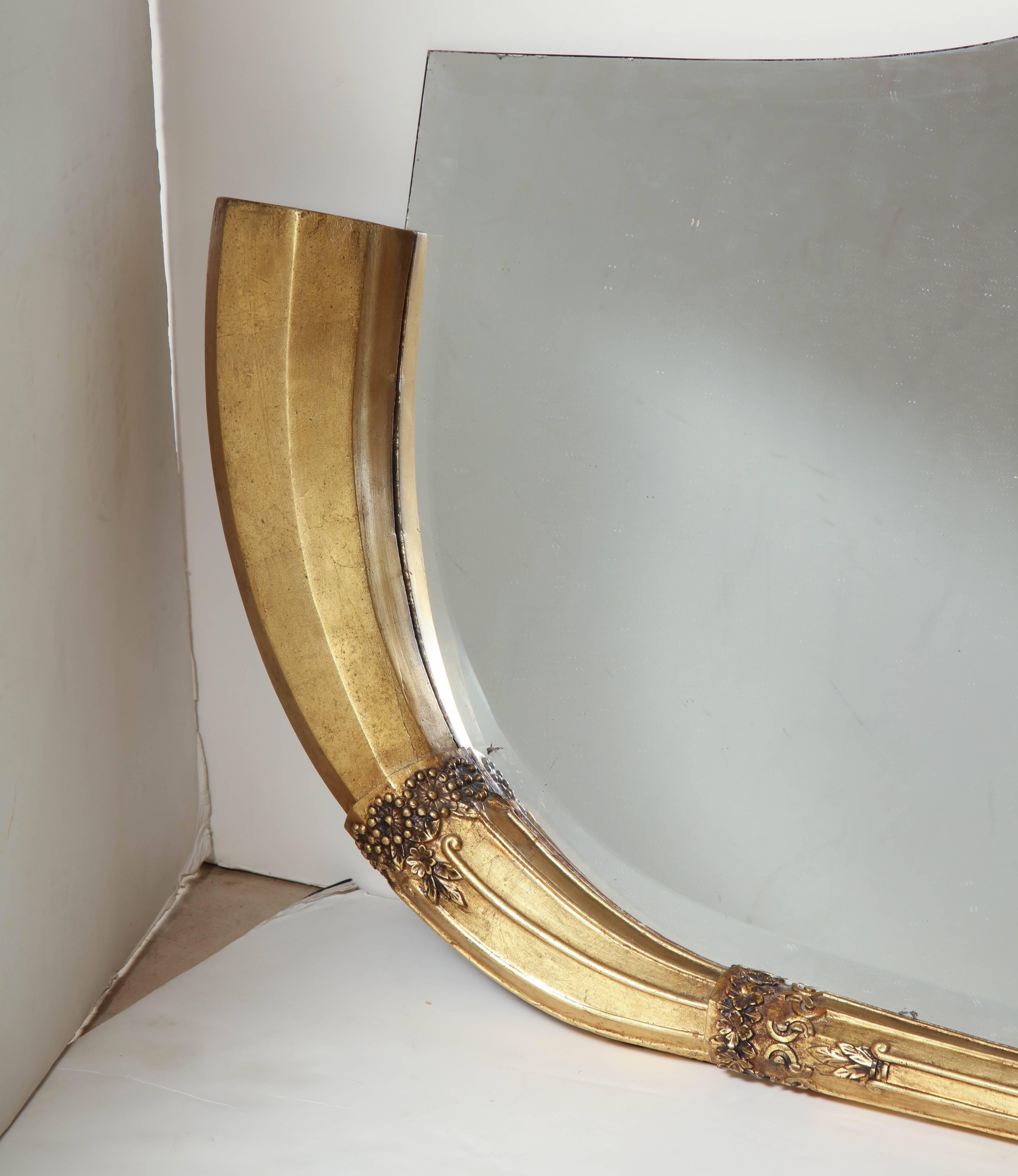 An unusual Art Deco overmantle mirror.