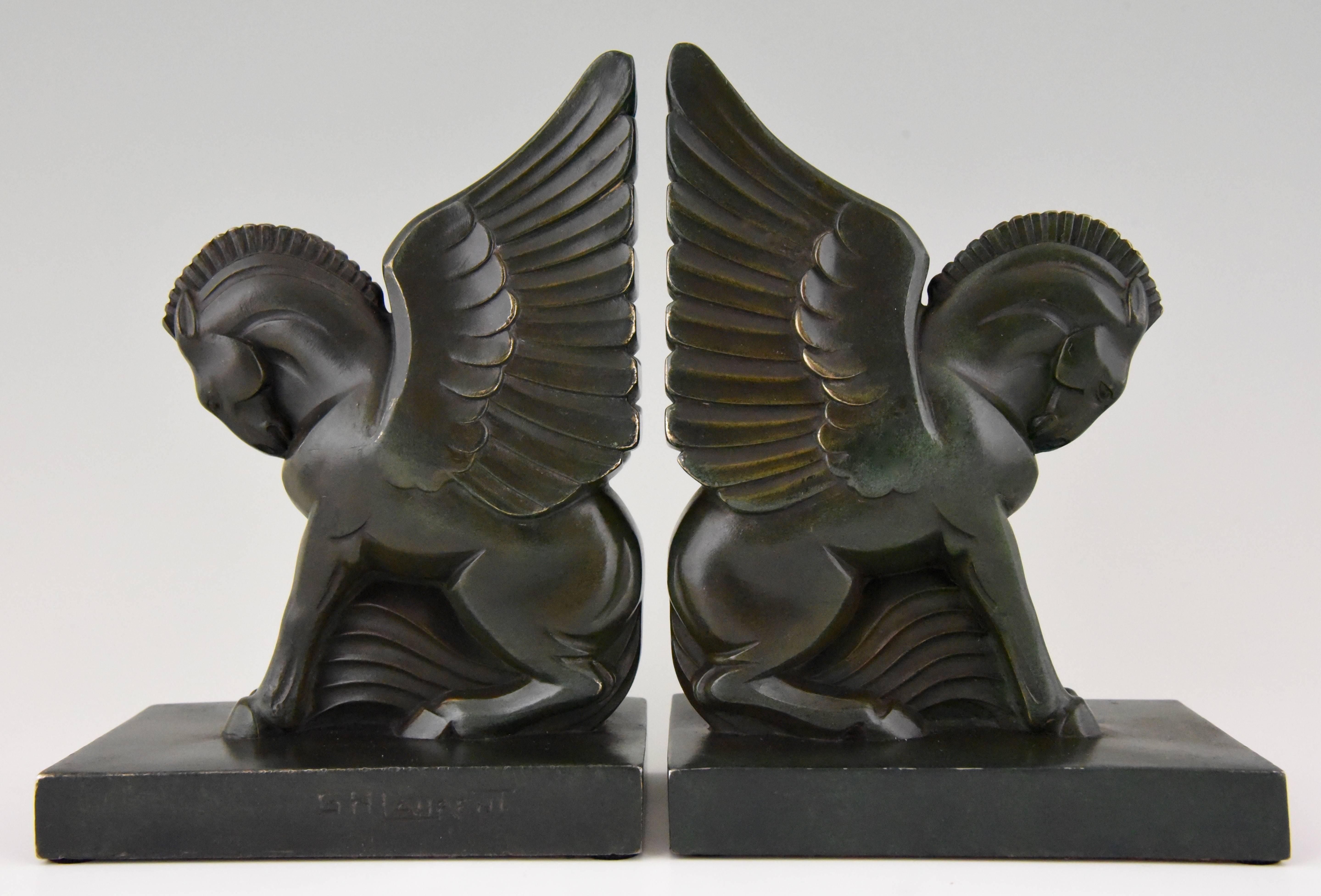 Pegasus, stylish pair of winged horse bookends by George H. Laurent France, circa 1930
Artist/ maker: Georges H. Laurent
Signature/ marks: G.H. Laurent
Style: Art Deco
Date: 1930
Material: Patinated Art metal. 
Origin: France
Size: 
H 18 cm