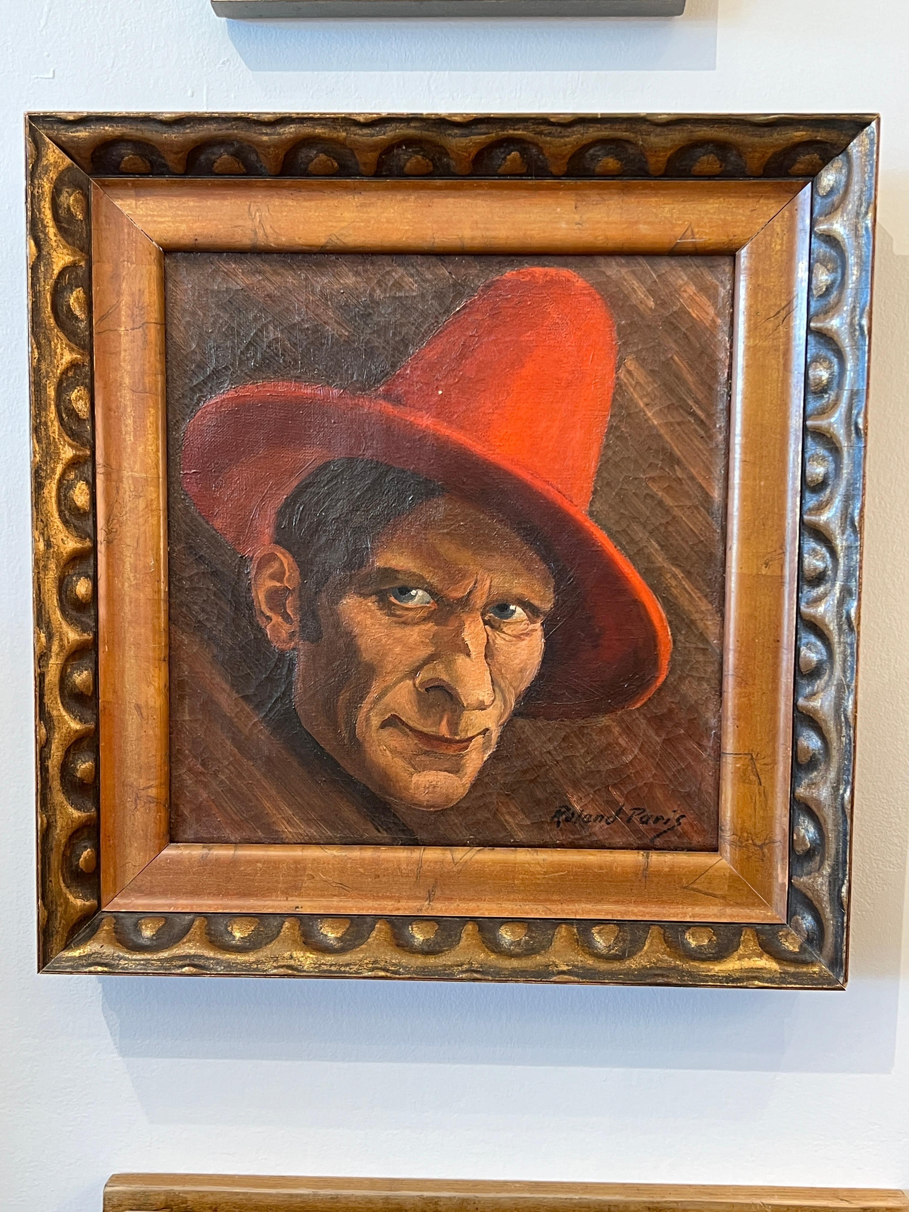 Self-Portrait de Roland Paris portant un chapeau rouge.

Signature : Roland Paris