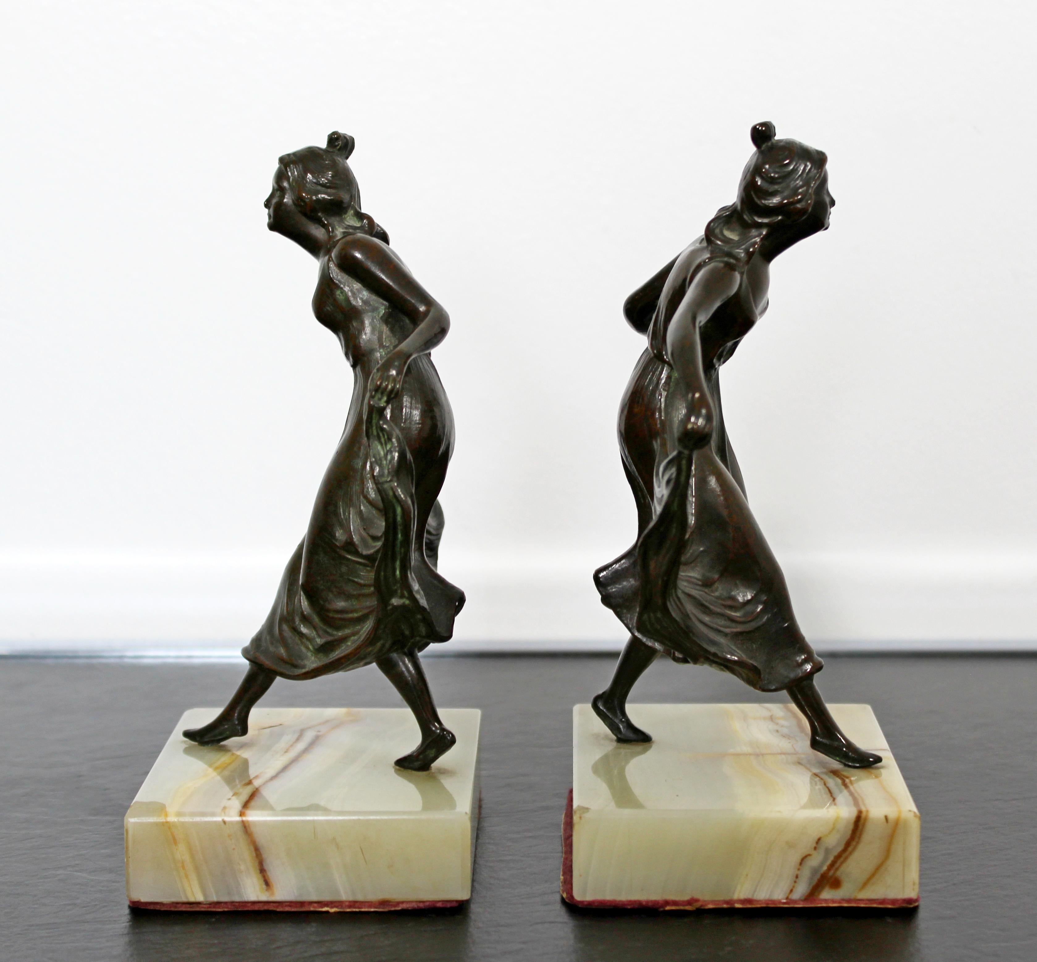 For your consideration is a sweet pair of bronze on marble bookends depicting girls dancing, circa the 1920s. In excellent antique condition. The dimensions of each are 5