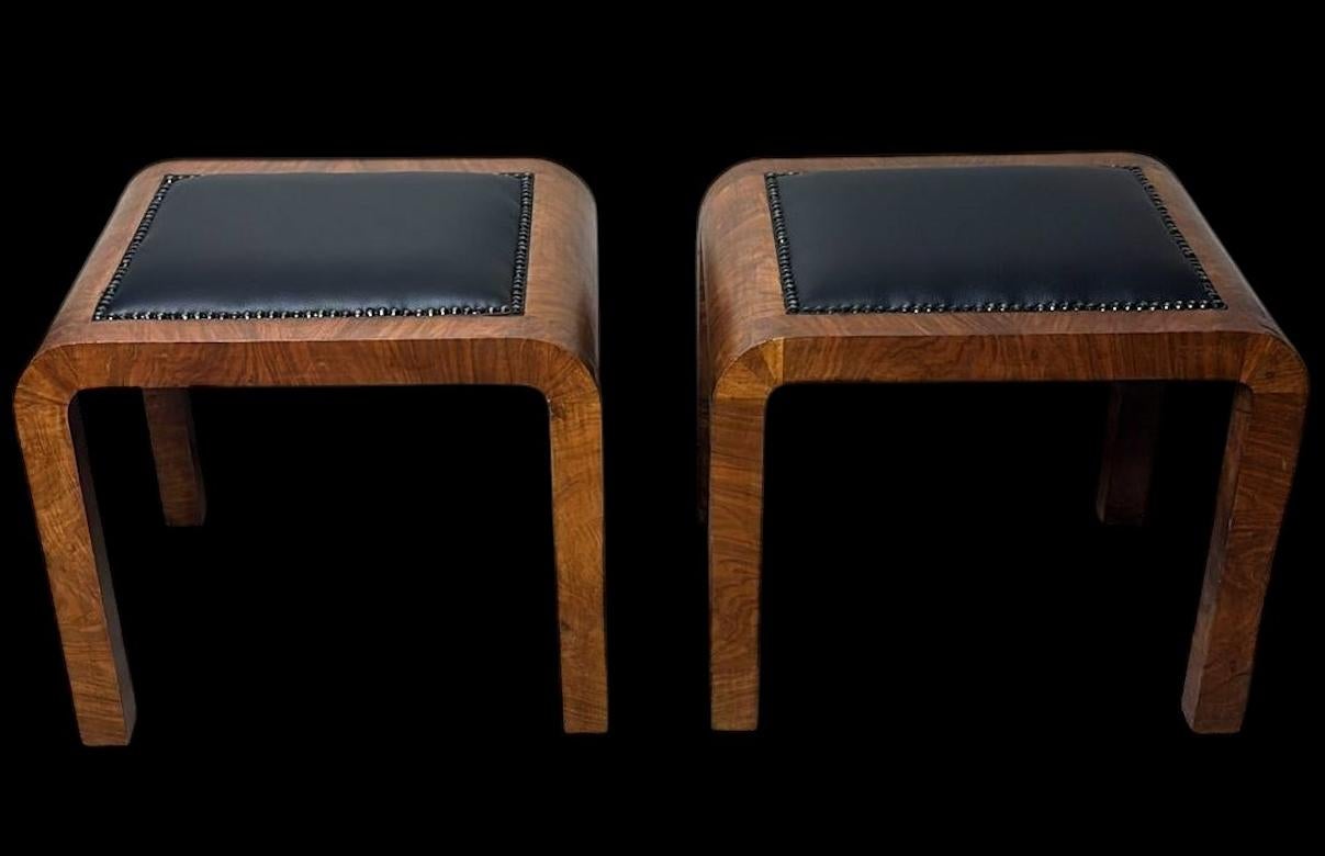 Elegant pair of veneered stools in fine walnut burl, crafted in Austria during the 1930s and attributable to the Art Deco style. With their clean and harmonious structure, they embody a quintessential example of Art Deco design—evoking period charm