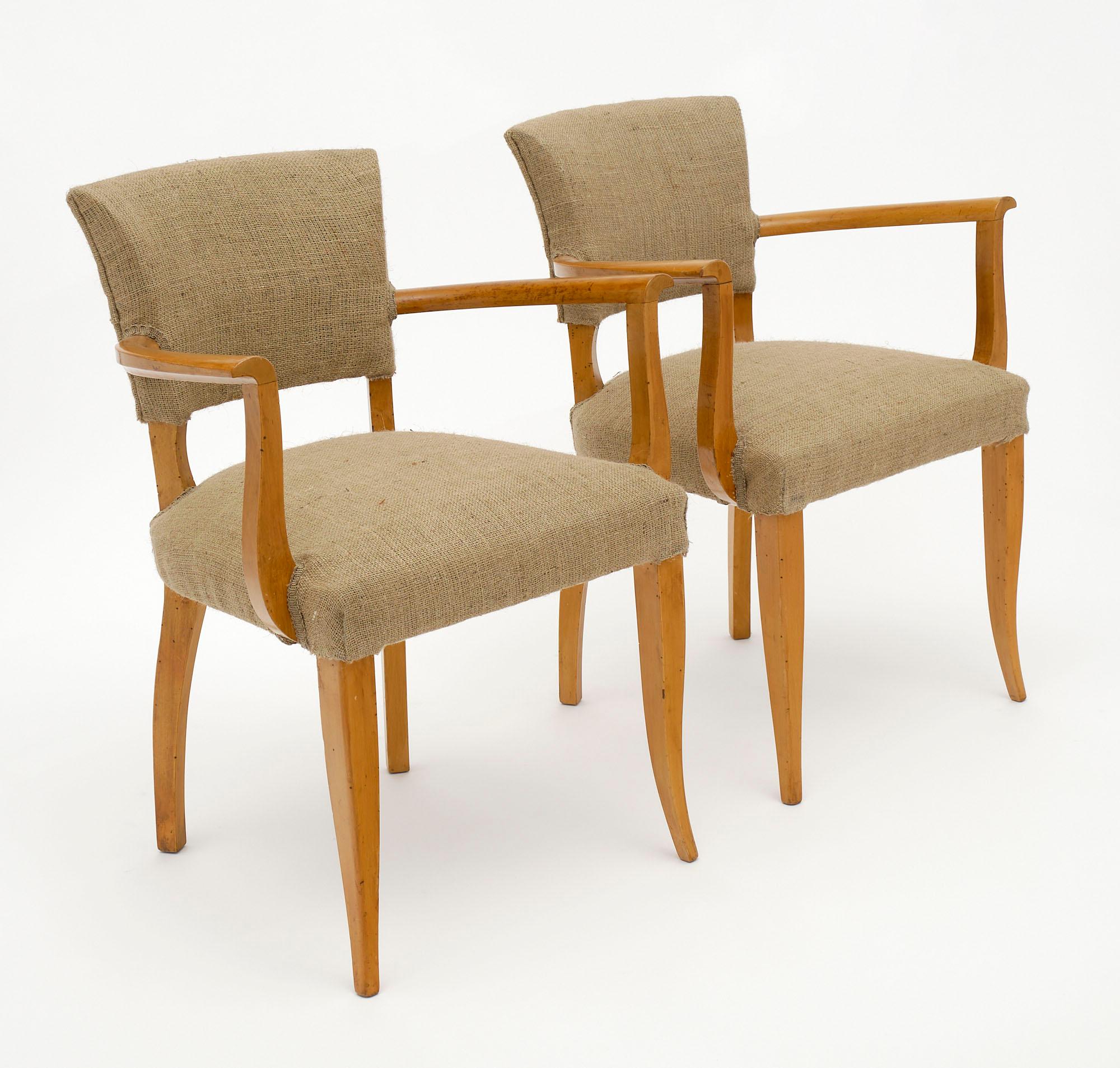 Pair of bridge chairs from the Art Deco period in France. This beautiful pair have strong; well-crafted structures of fruit wood finished in a lustrous museum-quality French polish. They have been newly upholstered in burlap. We love the classic Art