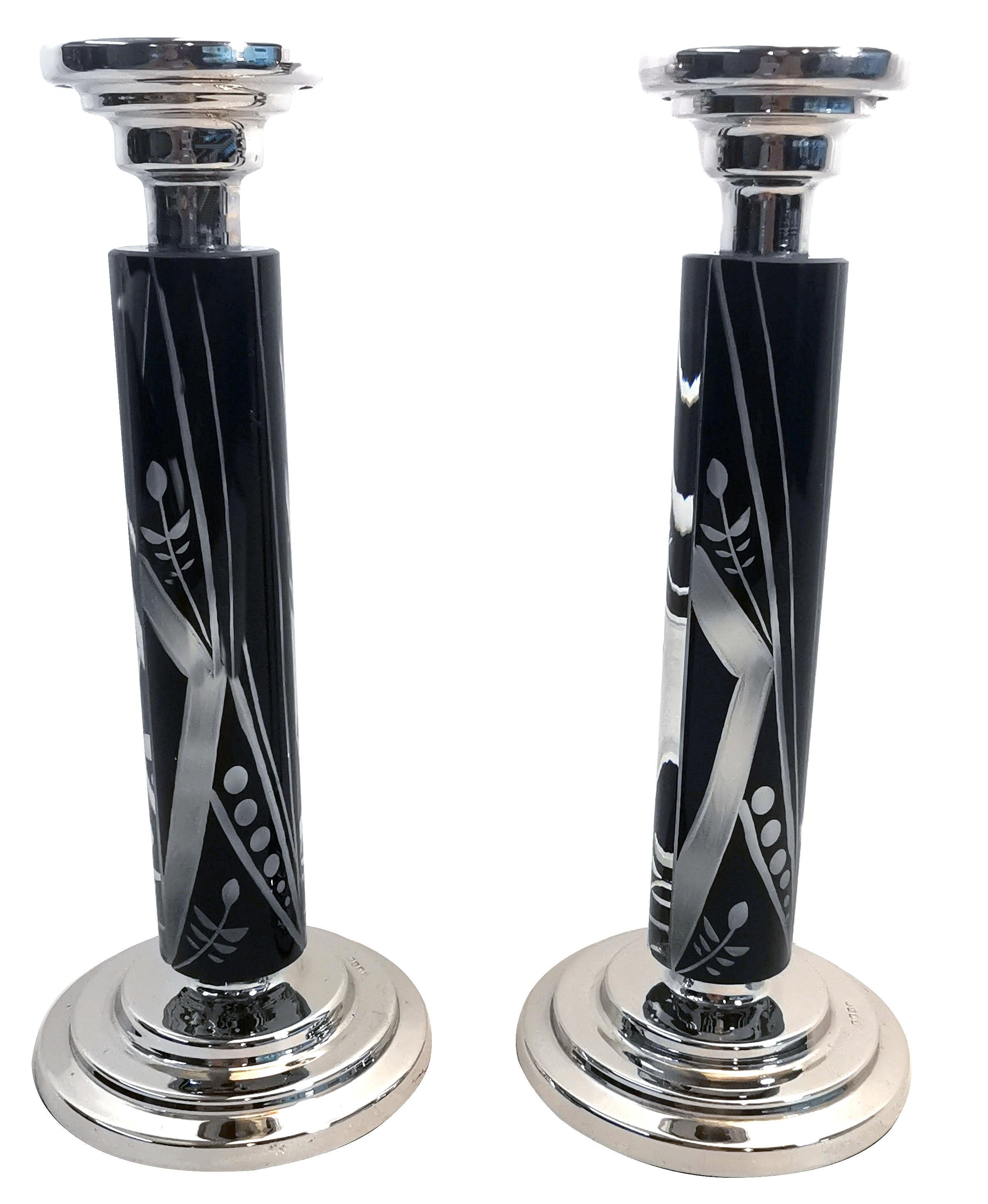 silver and glass candlesticks