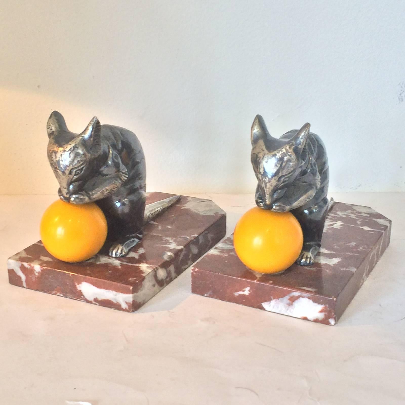 Art Deco bookends of Mice by H. Moreau with “Cheese” balls. Very rare design and both are signed to the left side of tail. Galalaith (French Bakelite) yellow balls all with excellent presentation, mounted of rouge and white veined marble with