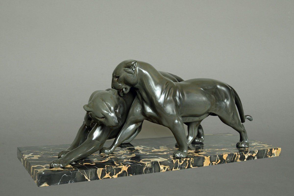 Art Deco Pair of Panthers by Plagnet, France circa 1930
Rare, elegant sculpture of two Panthers or a Pair of Panthers (Couple de panthères) from France around 1930
Design: Plagnet (engraved signature on the plinth)
Shelter / zinc cast, grey patina.