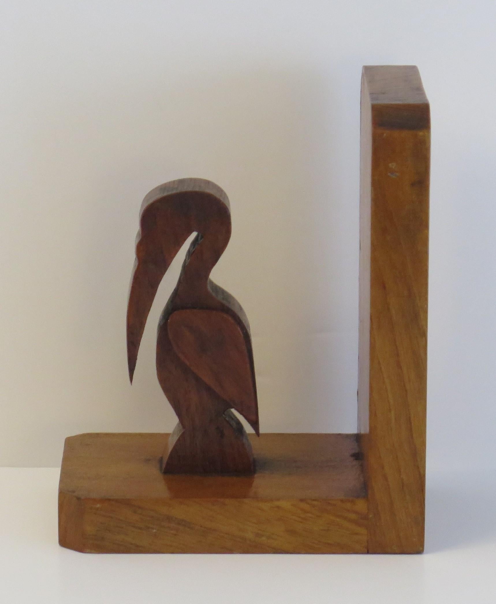 20th Century Art Deco Pair of Pelican Figure Bookends in Hand Carved Woods, circa 1930 For Sale