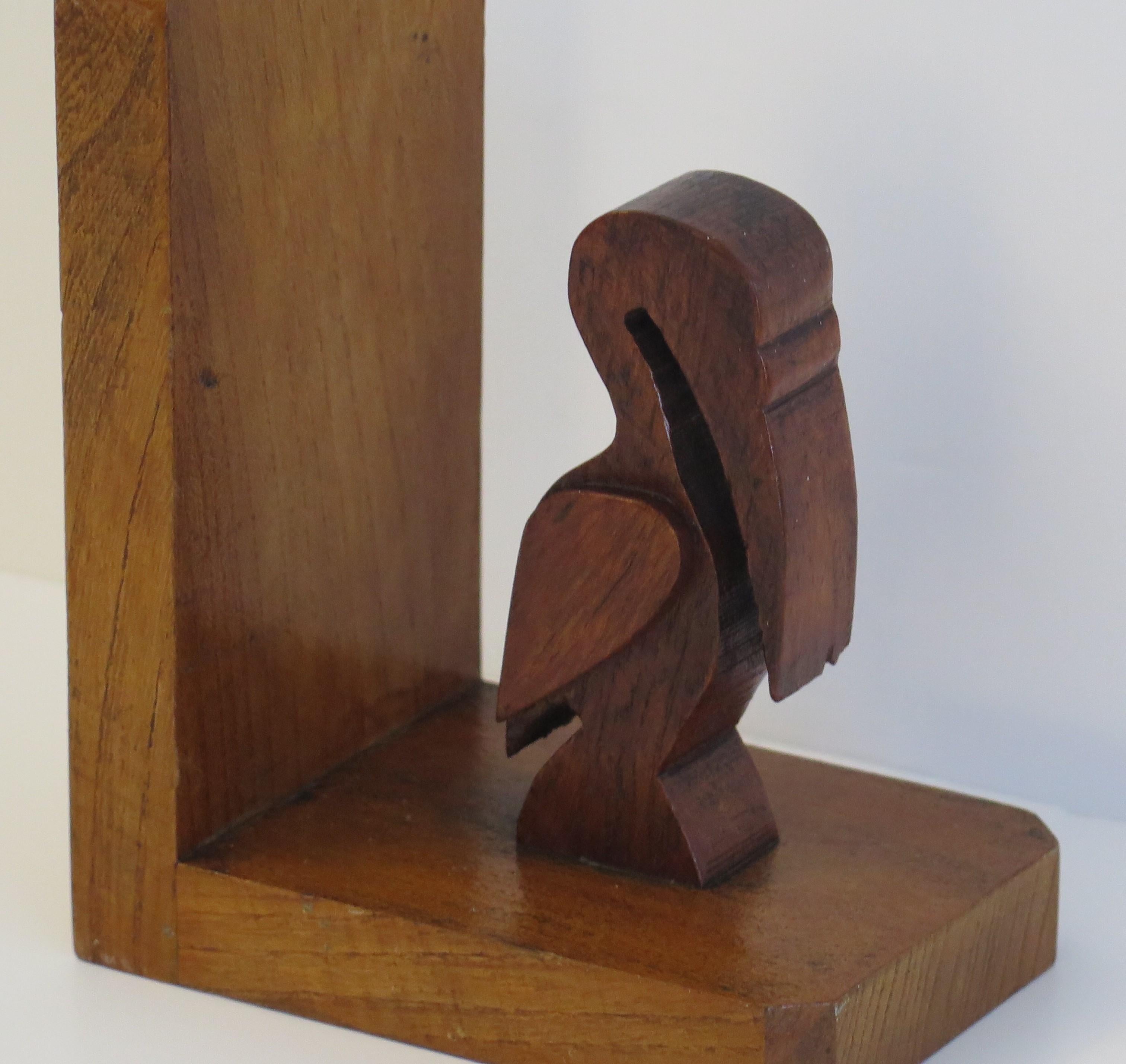 Art Deco Pair of Pelican Figure Bookends in Hand Carved Woods, circa 1930 For Sale 1